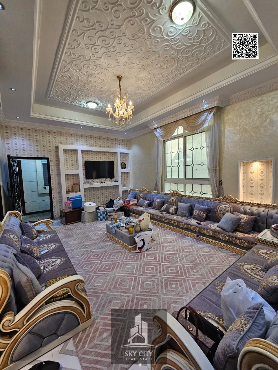 A stunning villa for sale in Ajman, Al Rawda area, at a bargain price including electricity, water, and air conditioning. This luxurious villa boasts