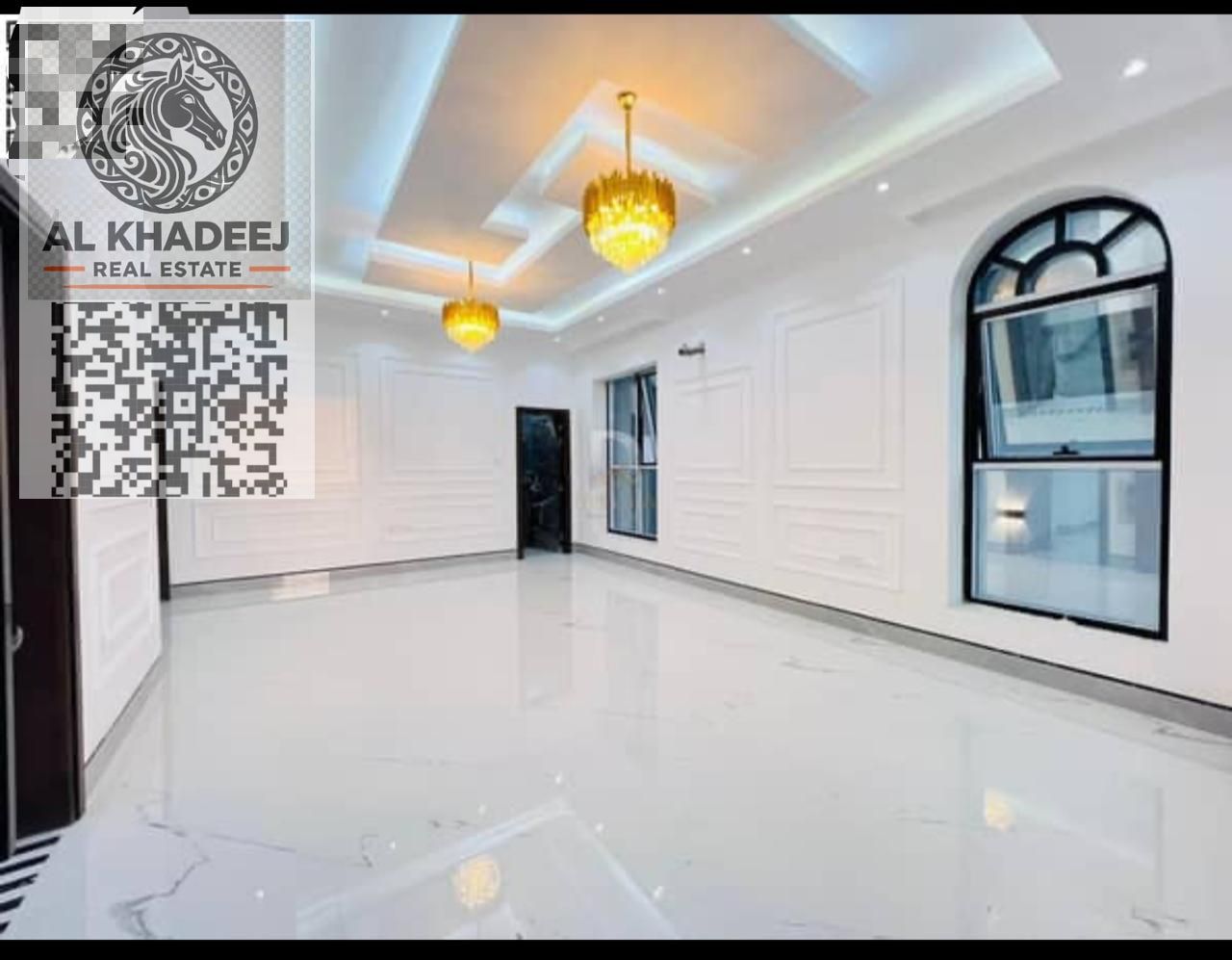 Modern villa for sale with excellent finishes, consisting of 7 master bedrooms, in Al Helio 2 area, near Emirates Road and Mohammed Bin Zayed Road.