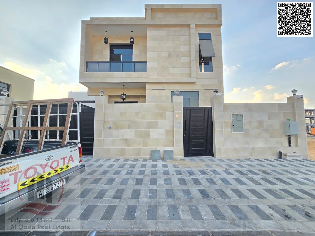 Villa for rent in Al Yasmin, 5 rooms, living room and majlis, excellent location, with electricity and air conditioning.