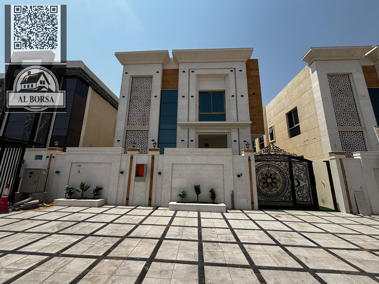 Villa for sale in Al Zahia, Ajman. 5 master bedrooms, majlis, spacious living room, kitchen, and maid's room.