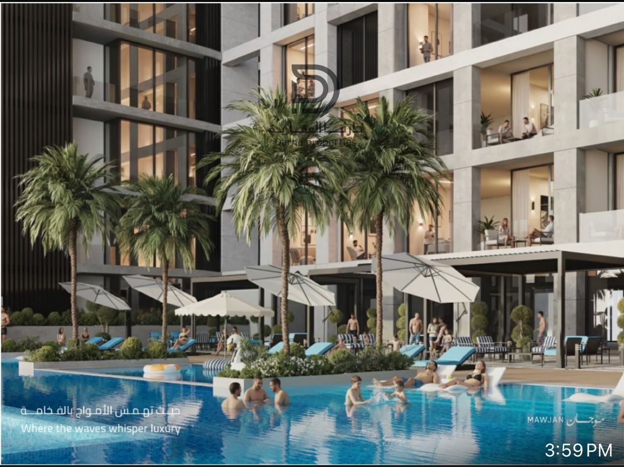 Own a luxurious studio on Ajman Corniche with a side sea and lake view in the premium Mojan project — prime location with full facilities, perfect for