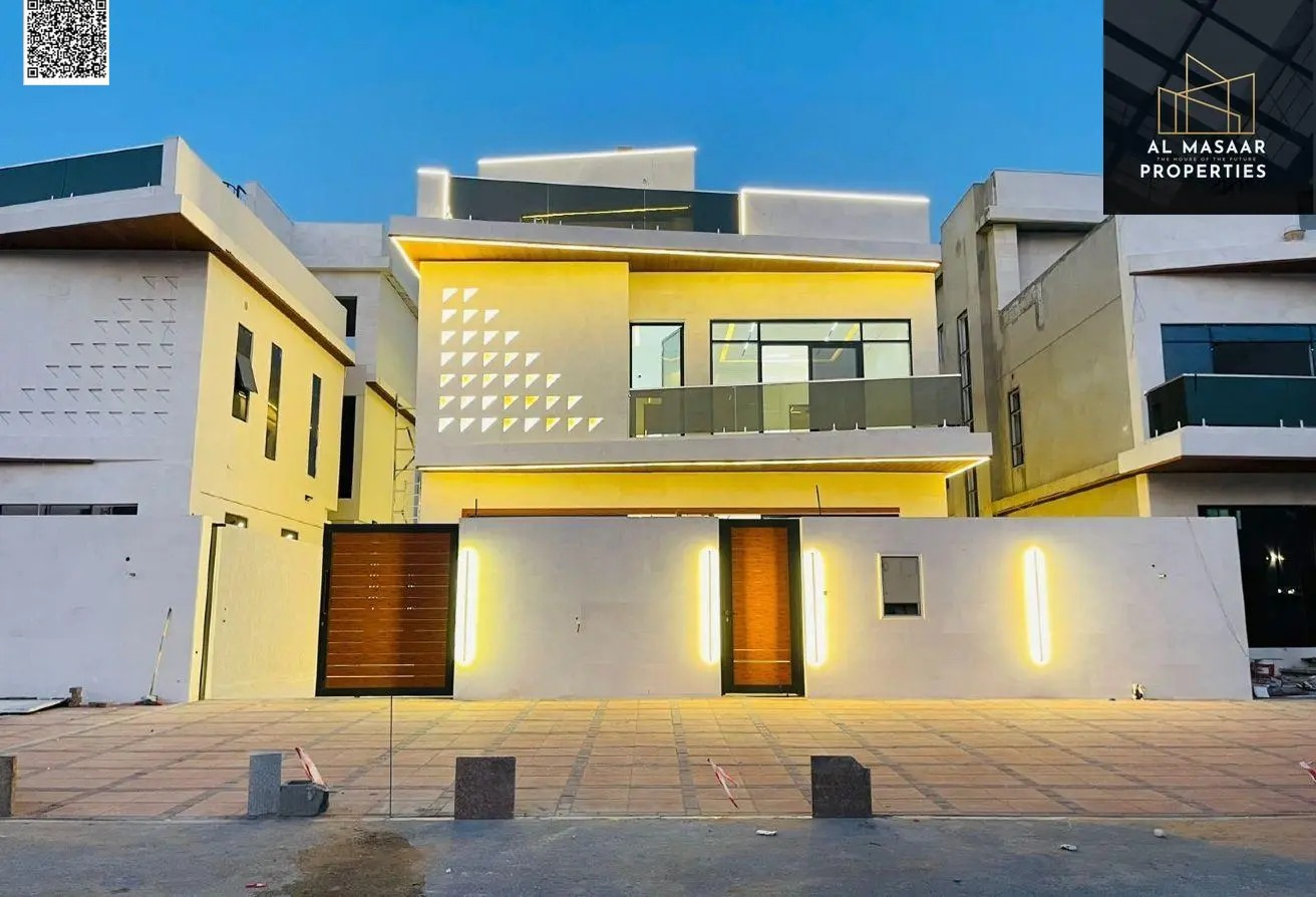 A villa at a price including registration and ownership fees , ready for occupancy in the most prestigious areas of Ajman, freehold