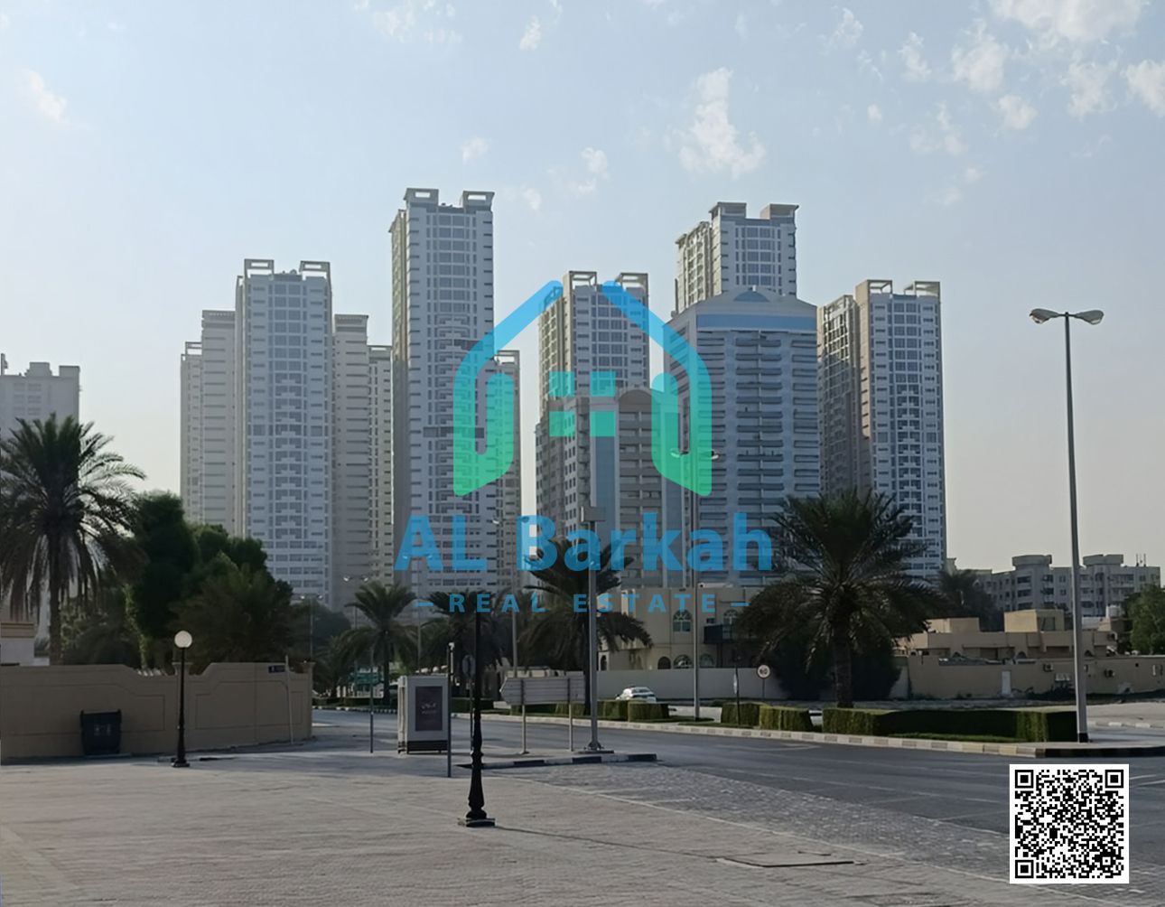 SPACIOUS ONE-BEDROOM APARTMENT FOR SALE — GARDEN-VIEW BALCONY - FULL AMENITIES - PRIME LOCATION - PAYMENT PLAN - AJMAN ONE TOWERS