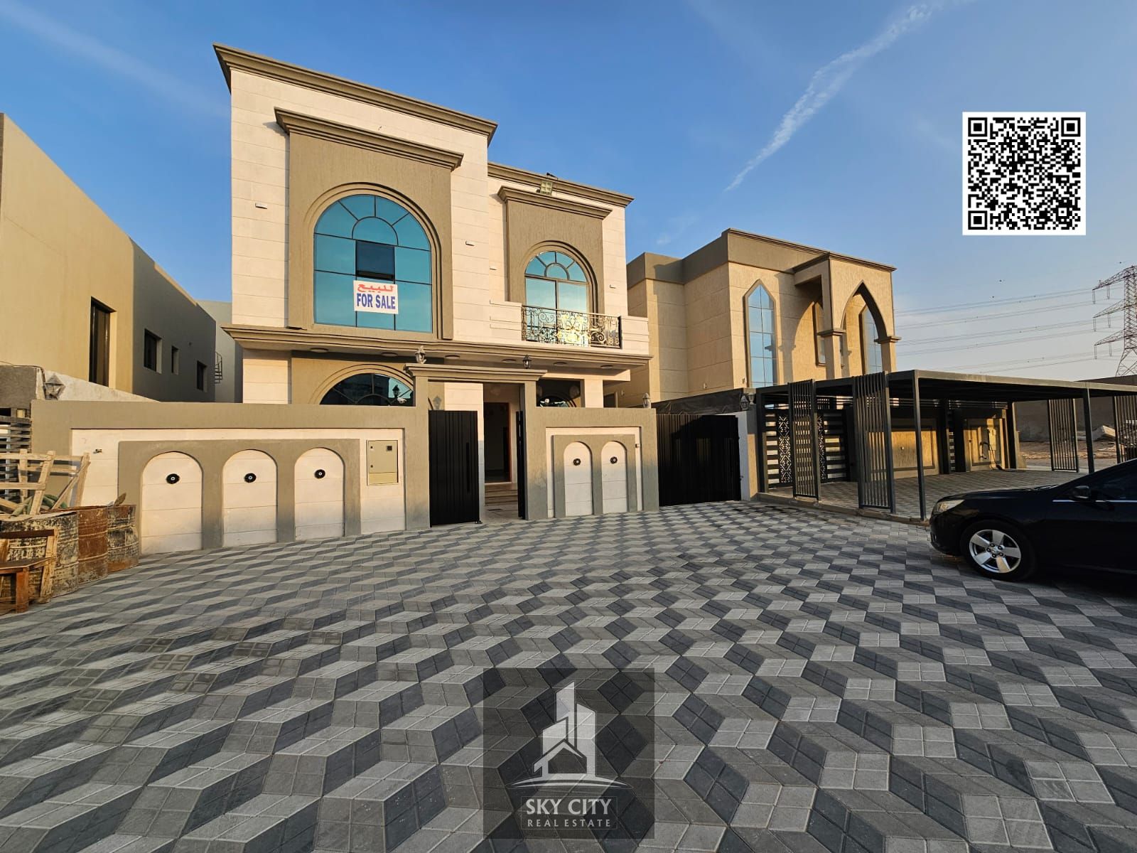 Luxury villa for sale in Al Helio 2, Ajman. Freehold ownership available to all nationalities. The villa is situated directly on the main road, with a