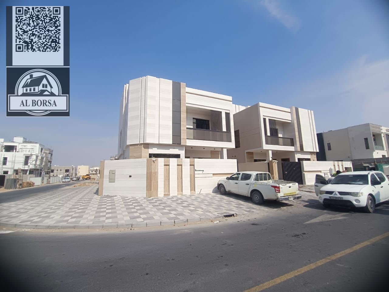 Corner villa for sale in Al Bahia. Ground floor, first floor, and roof. 6 bedrooms, living room, majlis, main kitchen, and preparation kitchen.