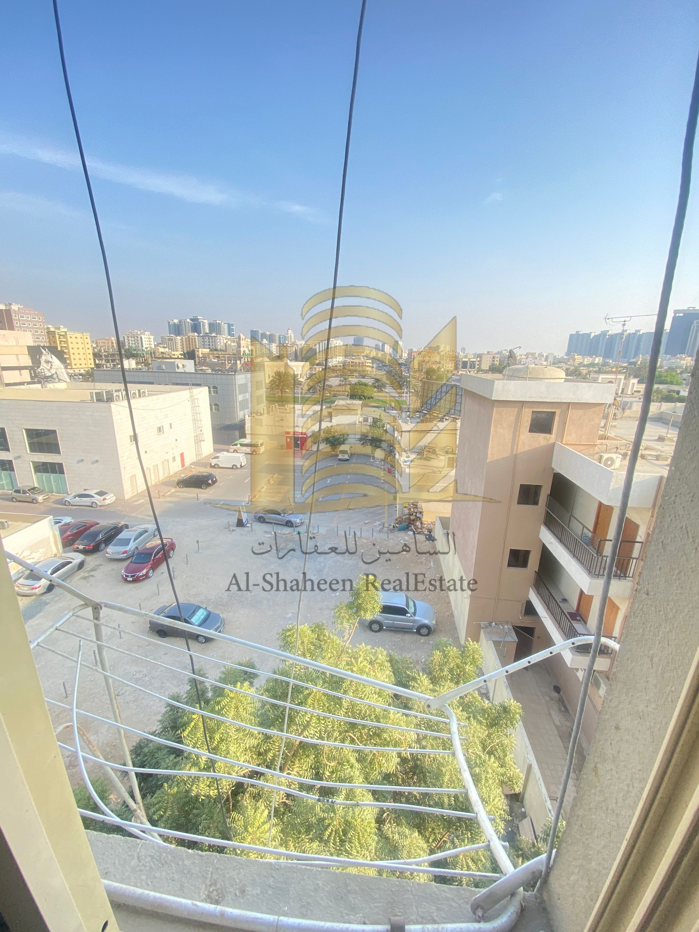 One-bedroom apartment with living room, bathroom, and kitchen (no air conditioning), overlooking a main street in Al Rumaila 1. AED 18,000