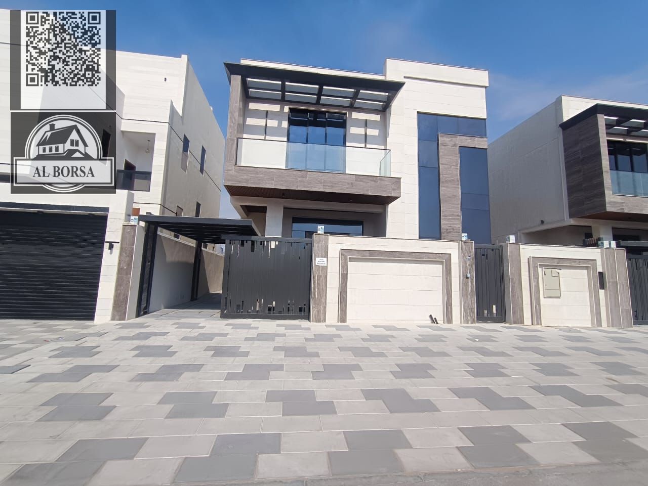 For sale in Al Bahia: a villa with 5 master bedrooms, a majlis (formal sitting room), two living rooms, two kitchens, built-in wardrobes, a balcony, a