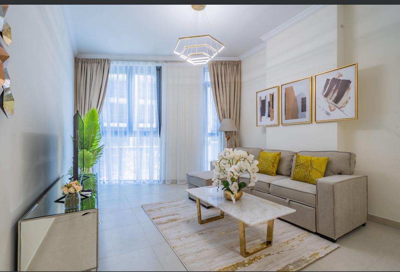 For sale fully furnished one bedroom in mirdif hills in multaqa Avenue building direct mall view asking 1.2 million