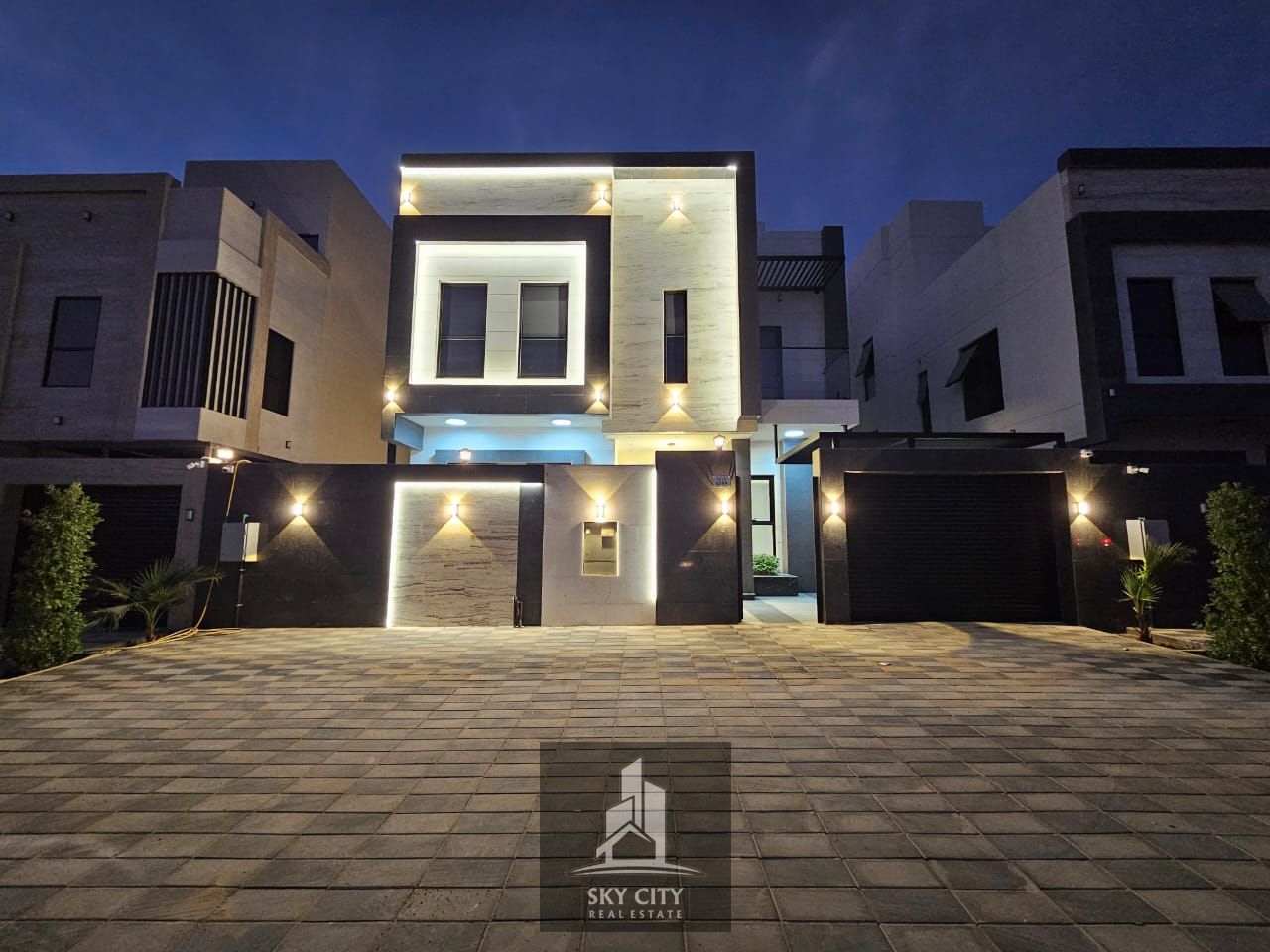 Modern villa with custom finishes and a spacious setback in Al Helio, at a special price including water, electricity, and air conditioning.