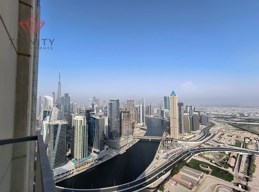 Move-In Ready | High Floor | Burj Khalifa & Canal View | Luxury Furnished
