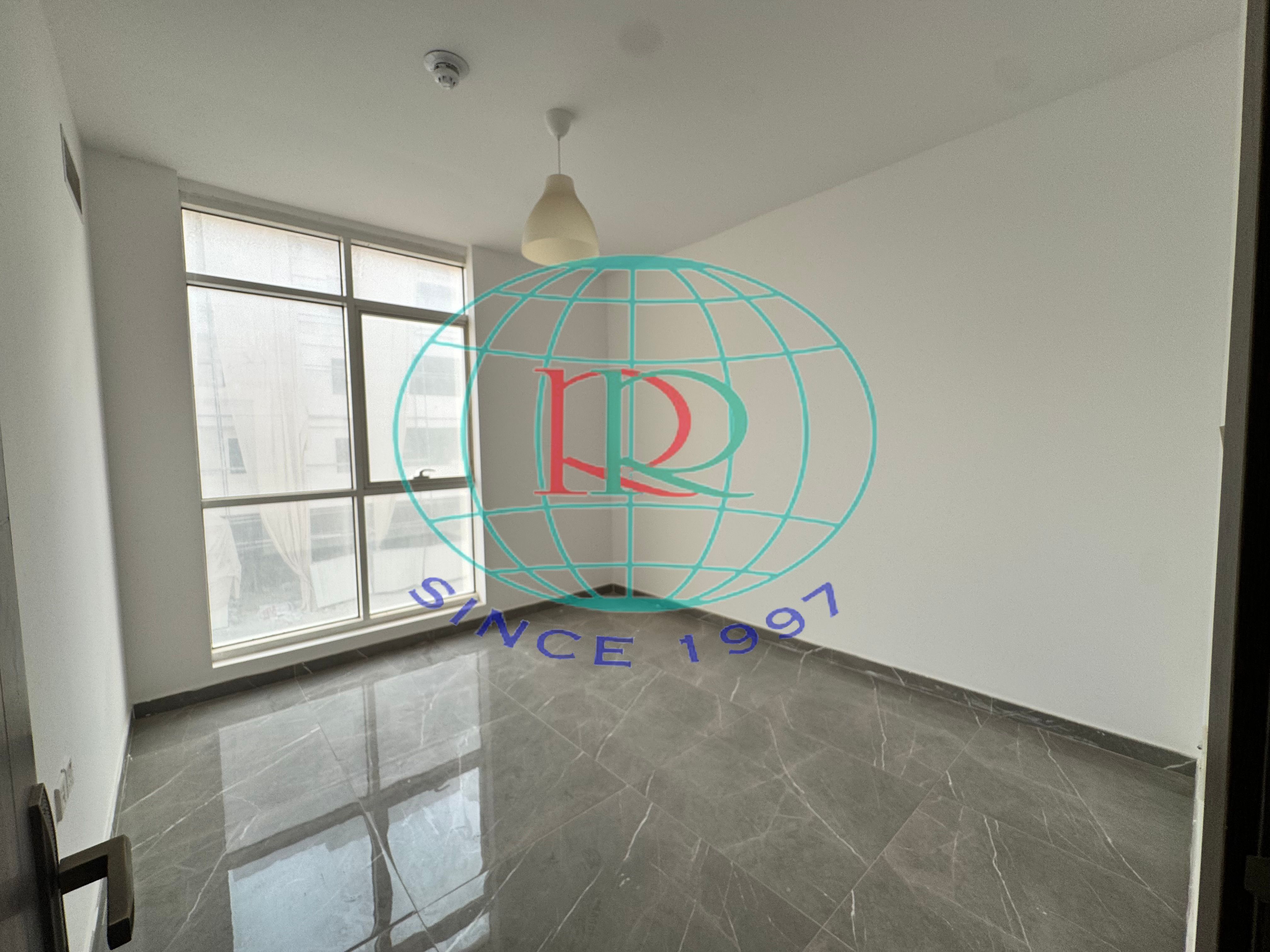 1 BR HALL FLAT WITH SPLIT DUCTED A/C AVAILABLE IN AL ZAHIA AREA NEAR ZAHIA CITY CENTER