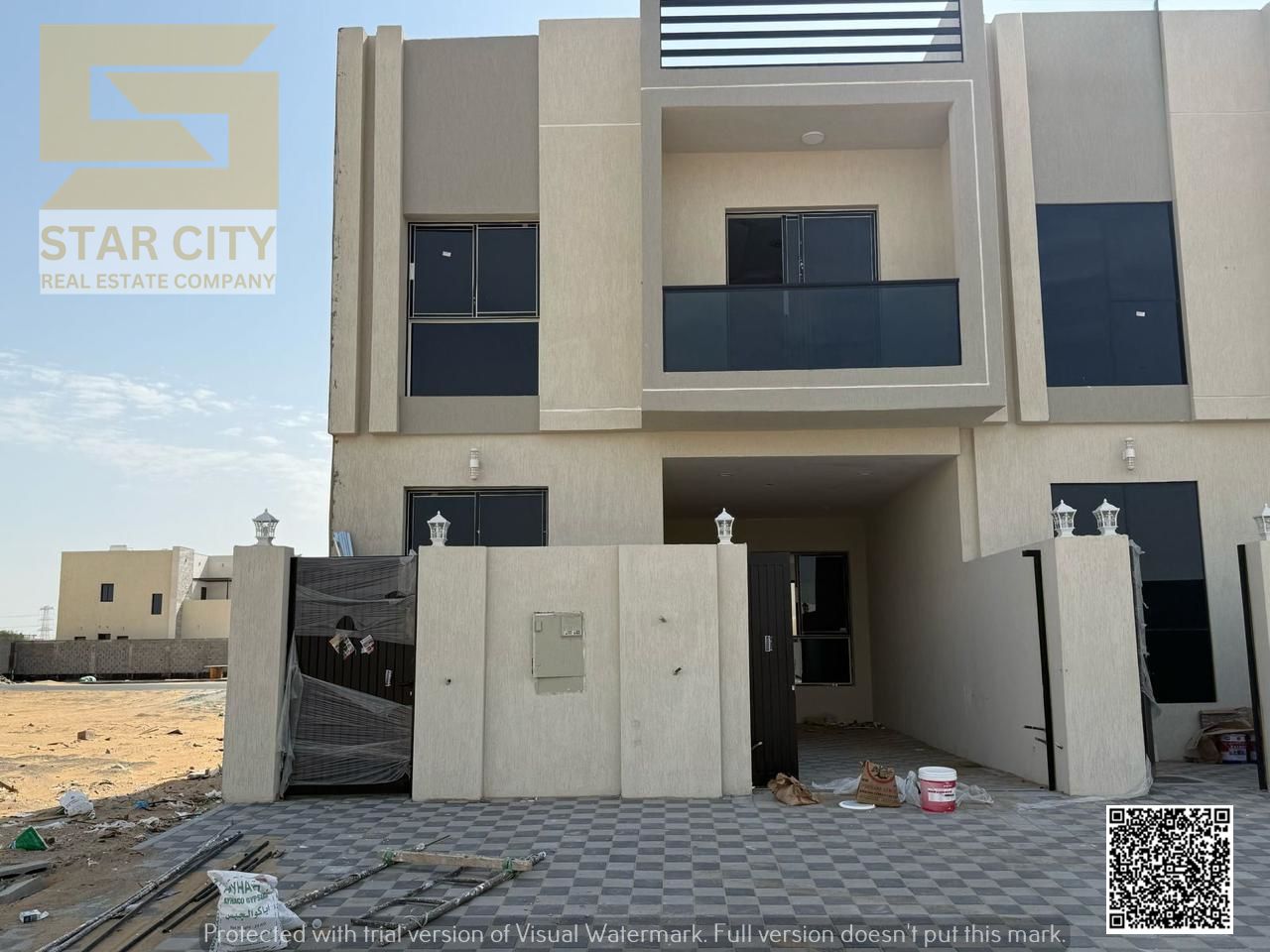 Luxury super deluxe villa for sale in Al Helio 2 area, Ajman, at an attractive price including registration and ownership fees.