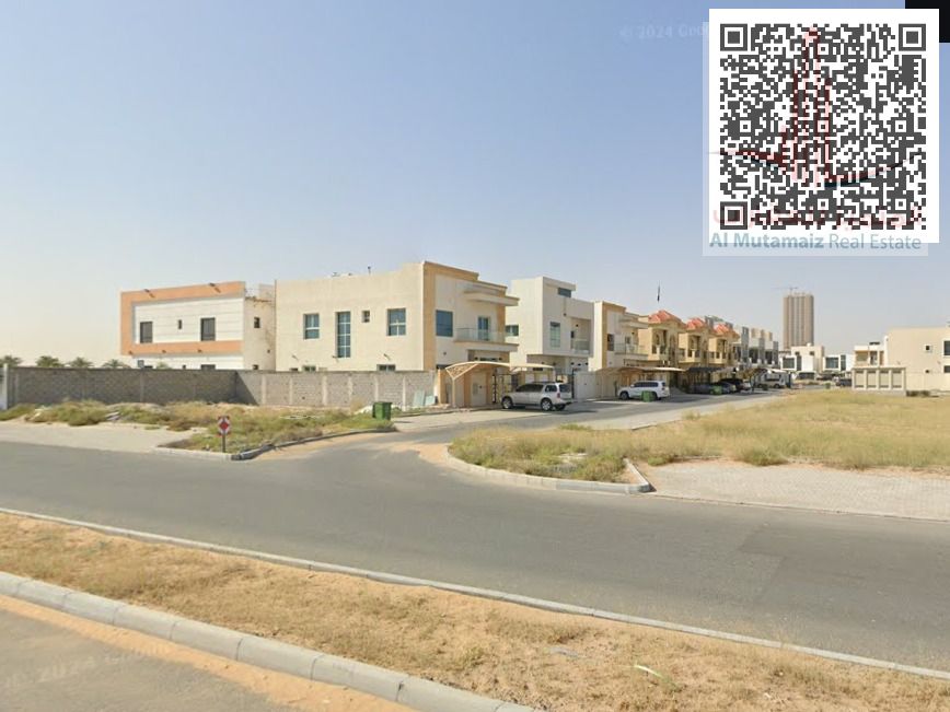 Land in Manama, residential/commercial, excellent location on a main street, large area.
