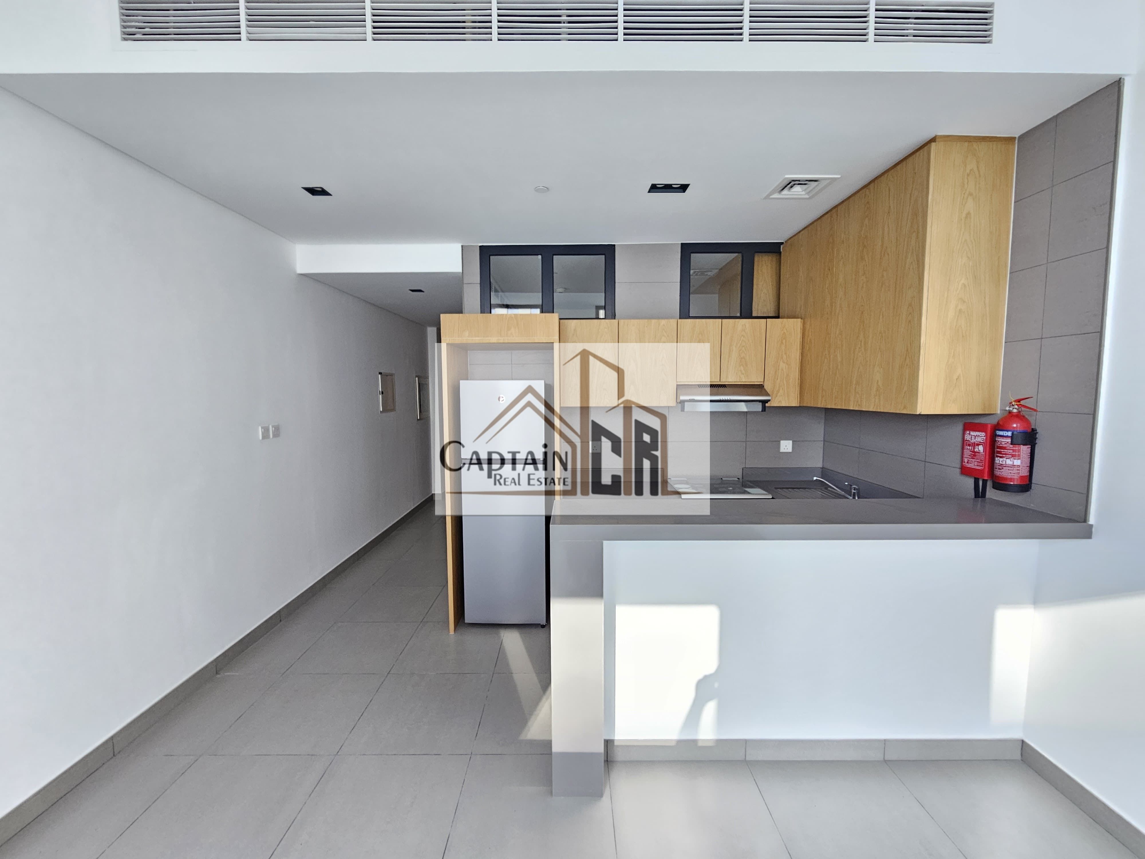 Spacious 1BHK Apartment with Kitchen Appliances for Sale in Al Mamsha RA 3