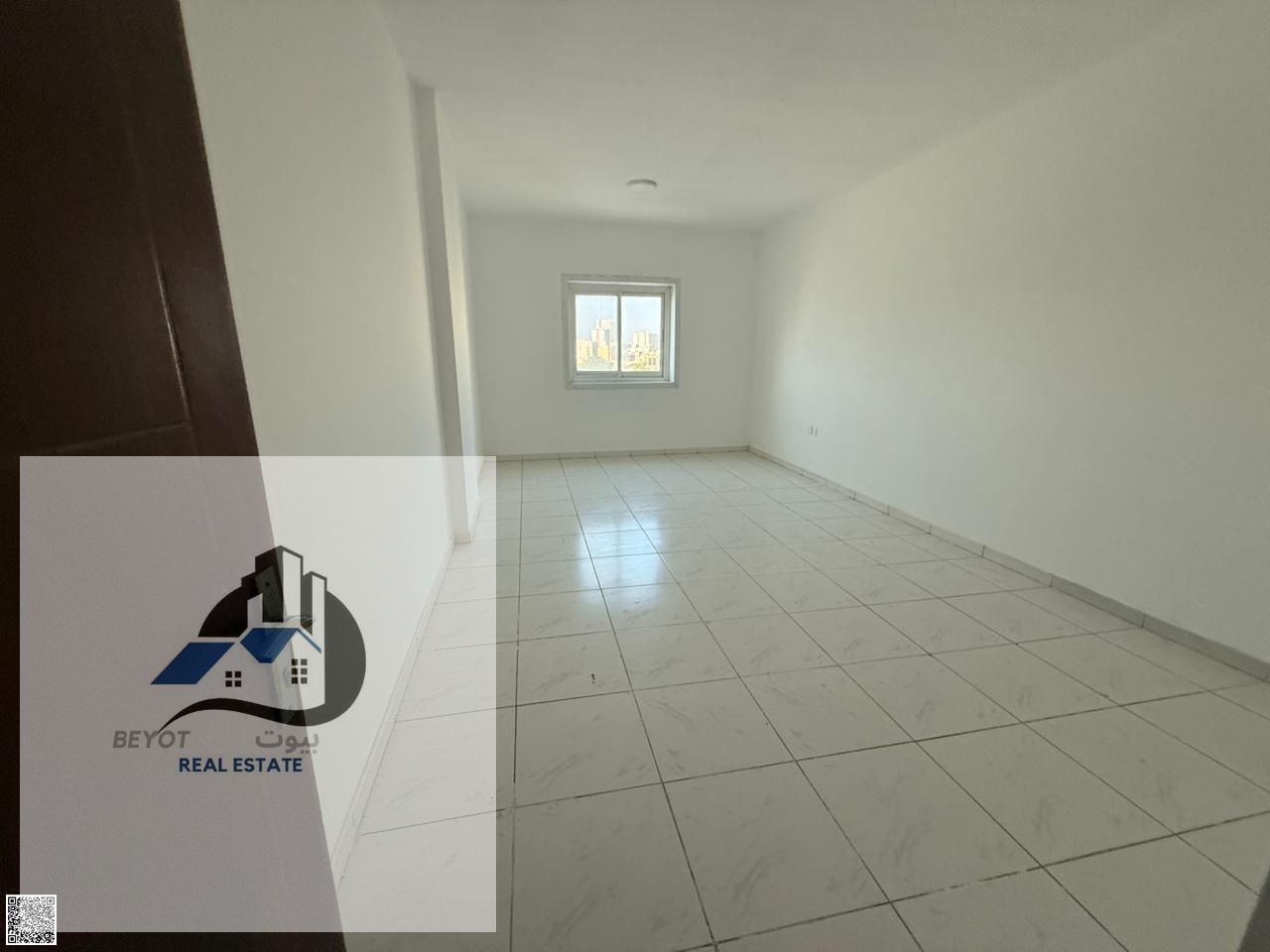 two bedrooms and a living room for annual rent Al Rashidiya 3 area, on the old traffic road
