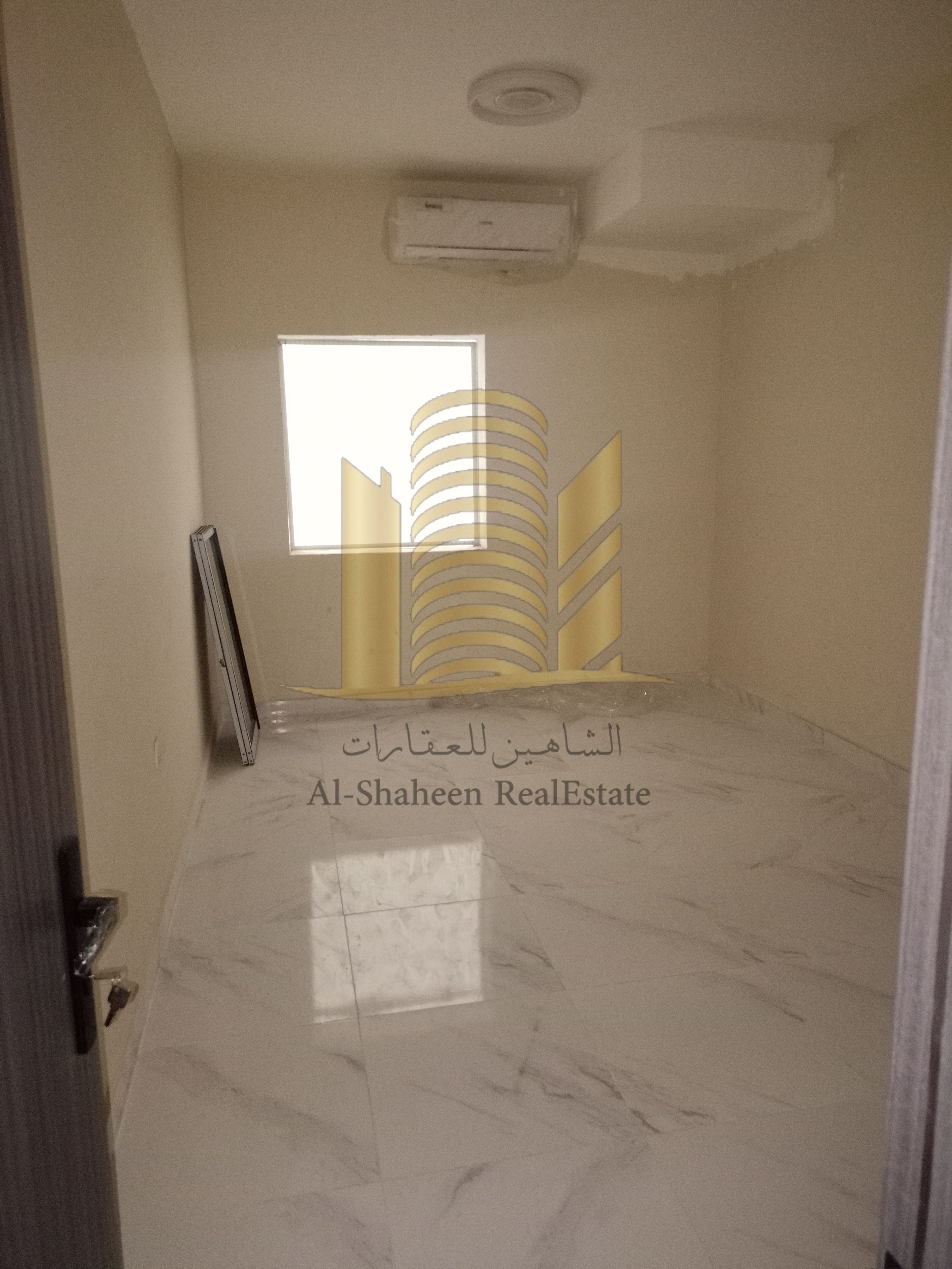 One-bedroom apartment for annual rent in Al Rashidiya, next to Lulu Hypermarket, new building, first occupancy.