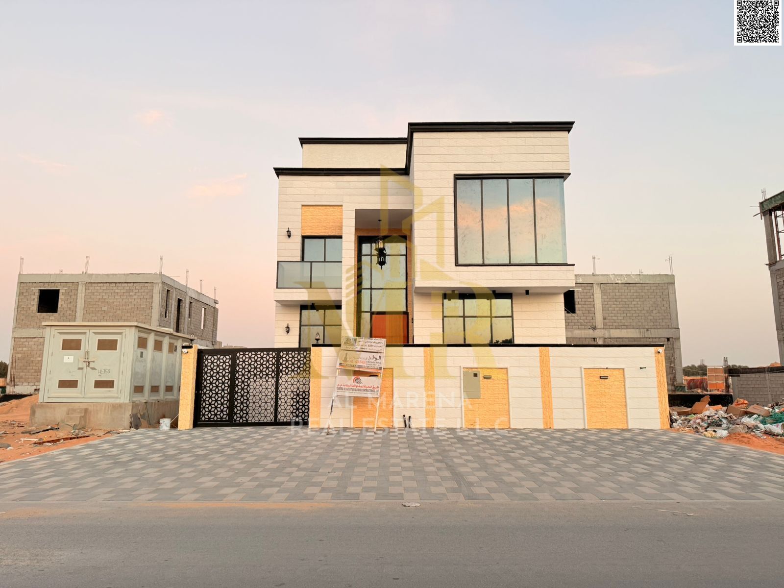 Two-story villa with a rooftop terrace for sale at a very attractive price in Ajman, Al Zahiyah area. Bank financing available. VIP finishing - built