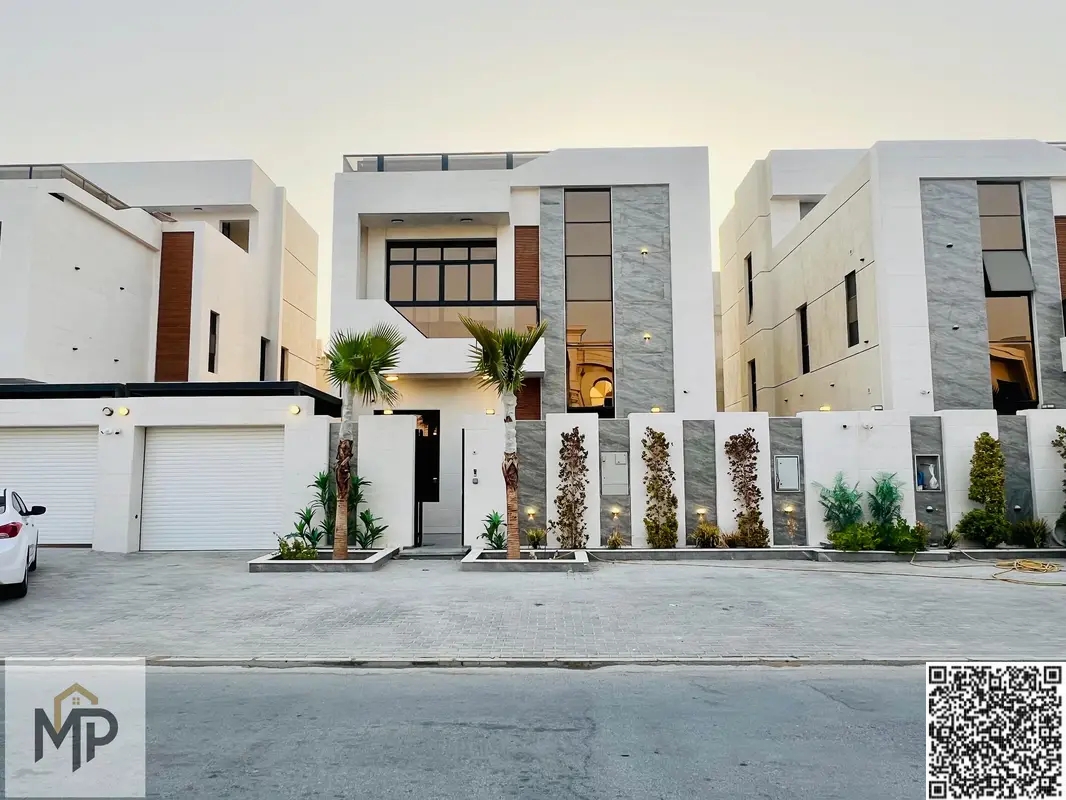 A luxurious villa located in the heart of Al Bahia district, including electricity, water, and air conditioning, spanning two floors with an elegantly