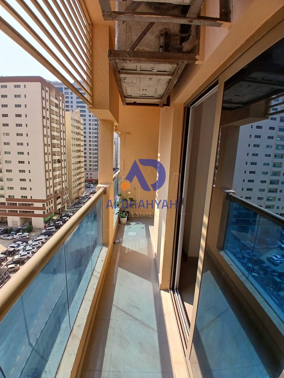 A distinctive apartment for annual rent in Al Taawun near Dubai Exit, consisting of two bedrooms, a living room, and a balcony.