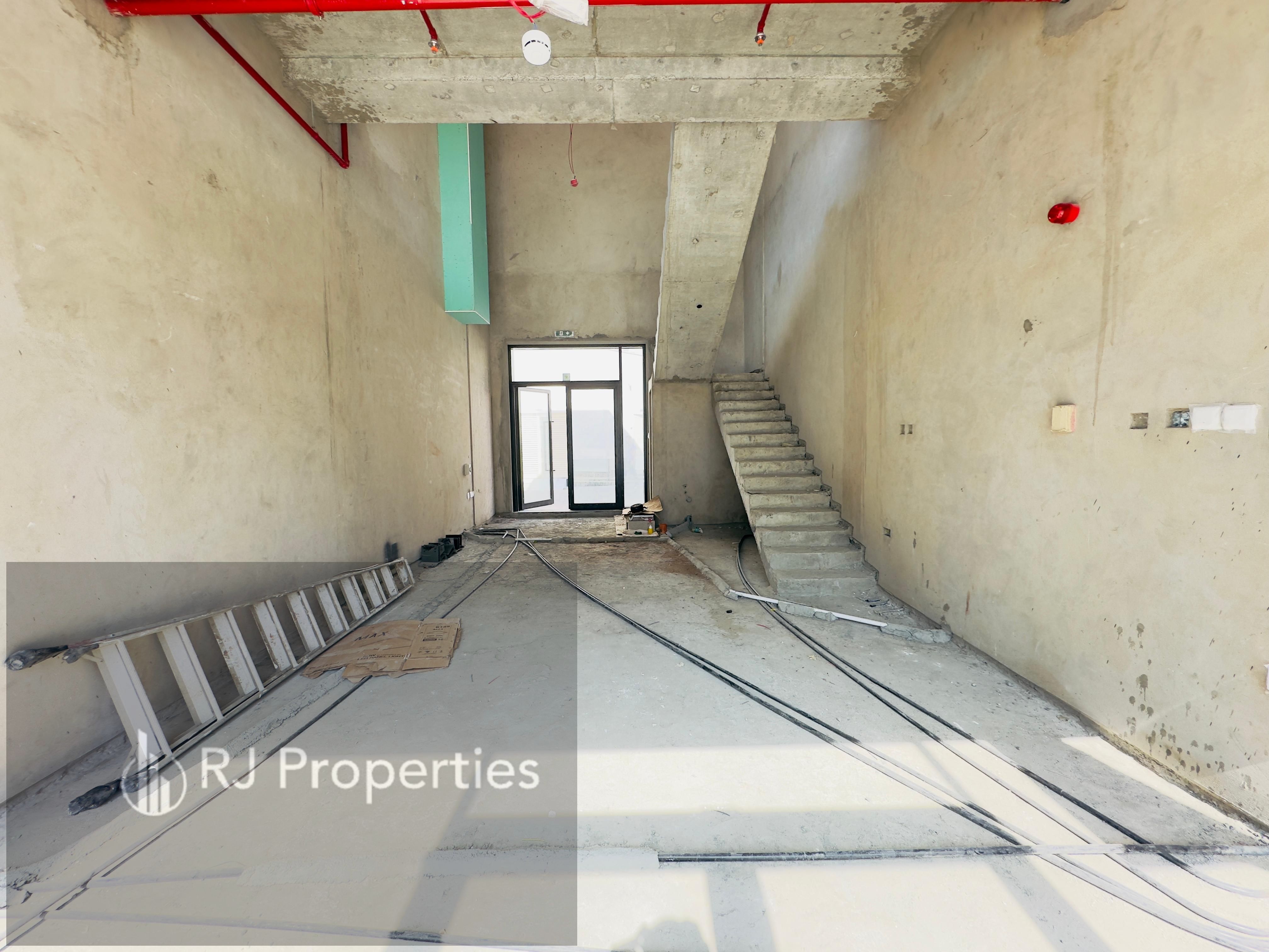 Brand New Comercial Shop Bright Location With Mezzanine Floor