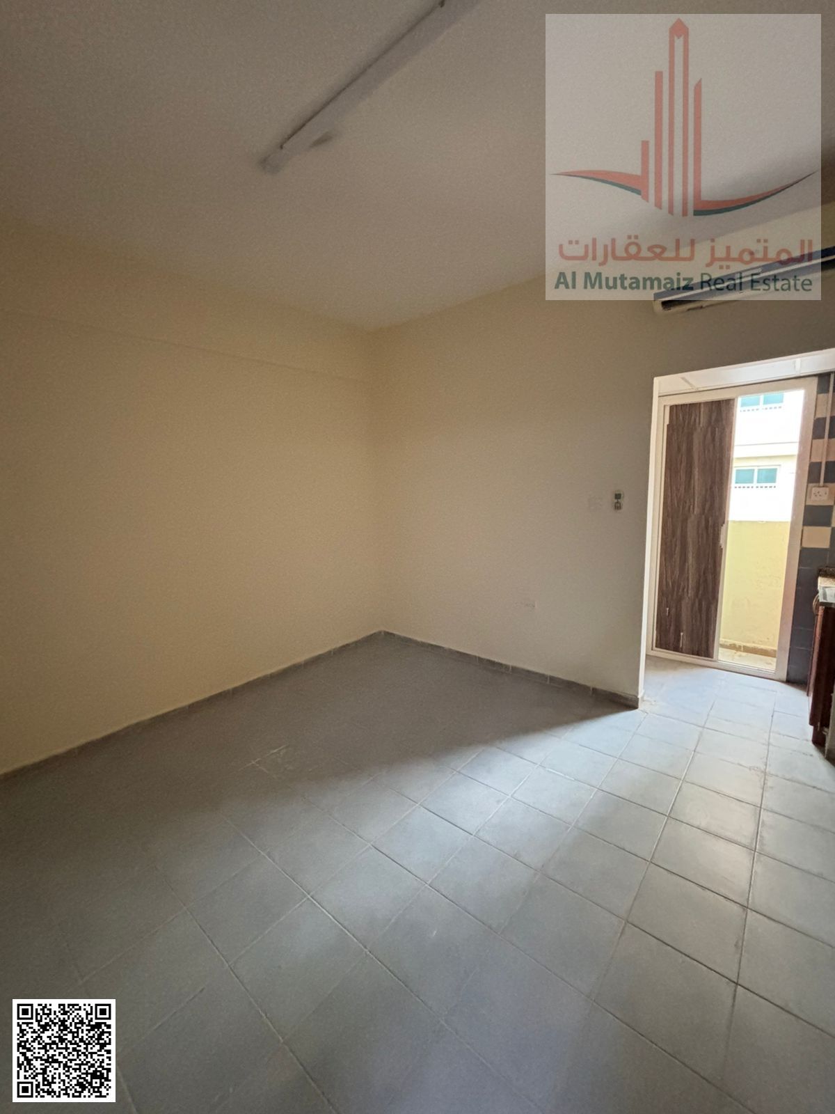 Studio apartment for annual rent in Sharjah, Al Nasiriyah area. Rent is AED 16,000, payable in installments, with a security deposit by check.