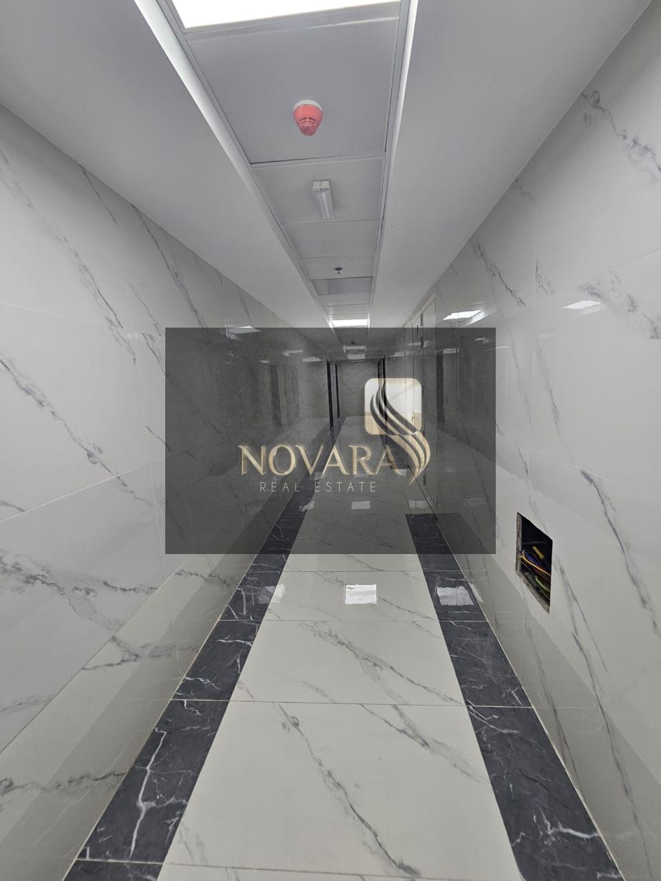 Excellent opportunity for annual rent in Al Jurf Industrial Area: 3 new offices consisting of a room, a hall, and two bathrooms – behind the Chinese m