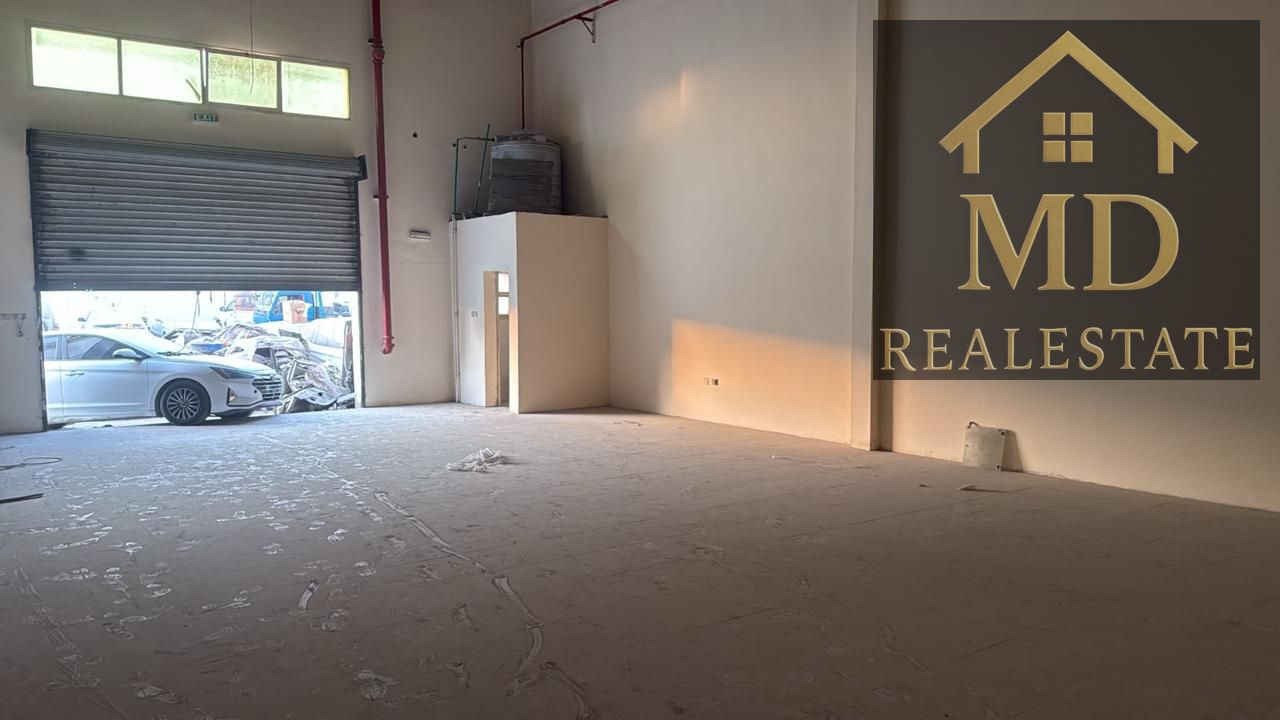 A golden opportunity for rent – a prime warehouse in Al Jurf Industrial Area, suitable for all commercial and industrial activities or as a car gara