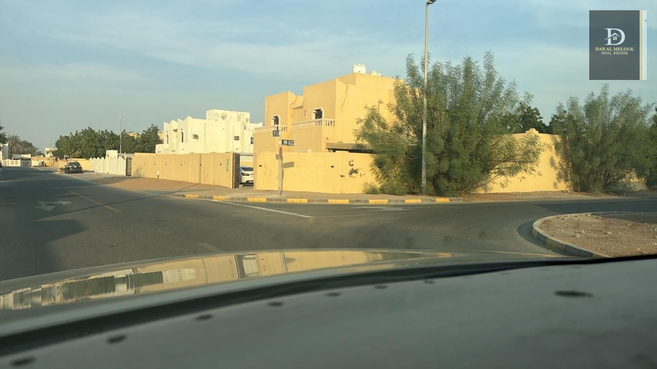 For Sale in Sharjah Al Qarain 1 Area Two-Story Villa 17,000 sq ft Corner plot on two paved streets