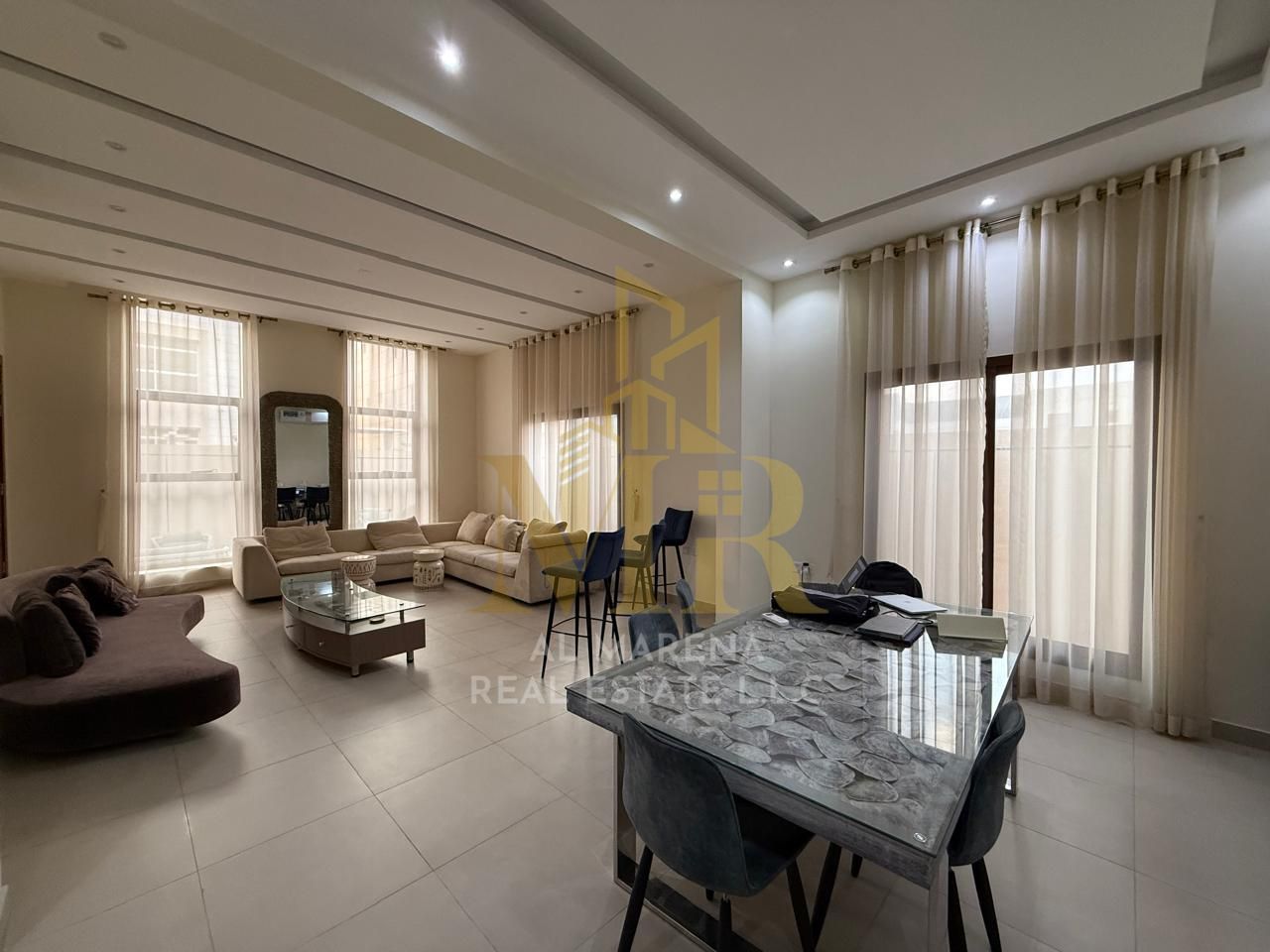 Villa for sale in Ajman. The villa is a G+1 (ground floor plus one) with electricity and water included, featuring 5 master bedrooms, a majlis (formal