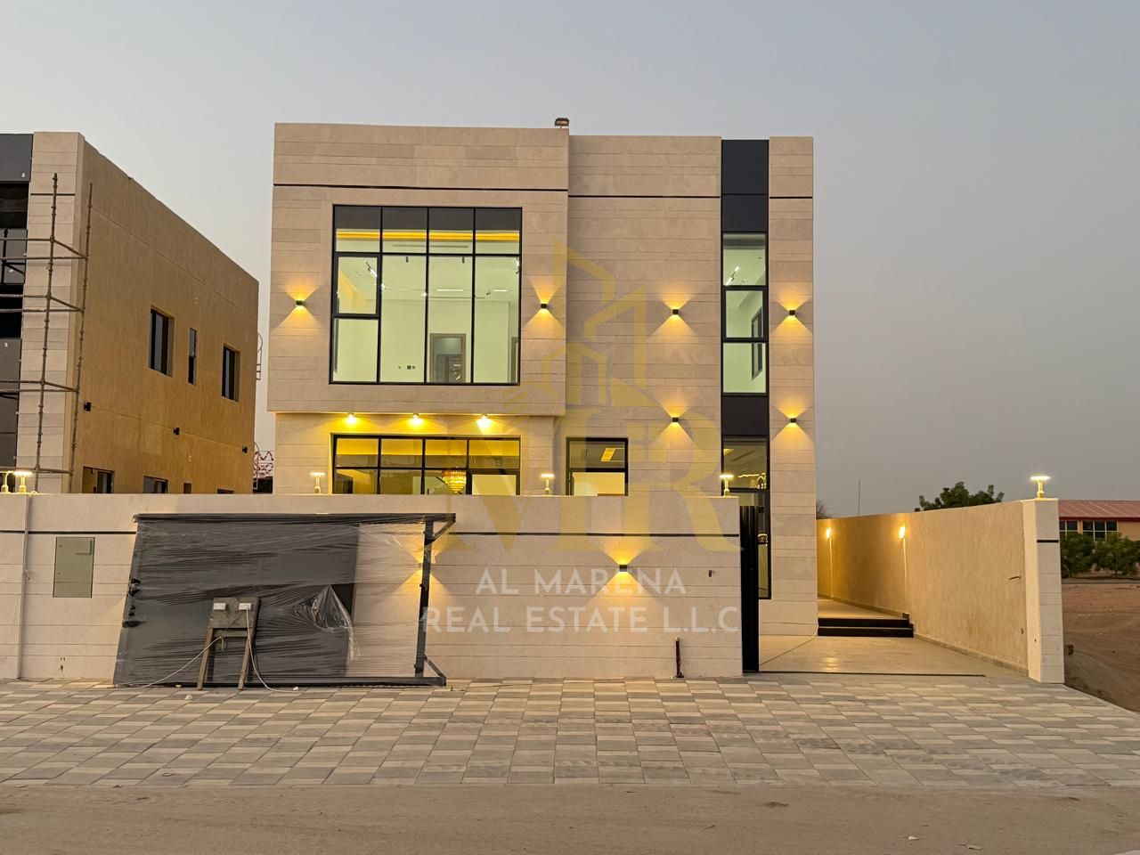 In the heart of Al Bahia district in Ajman, close to the main road and adjacent to a mosque, we present a luxurious villa that combines elegance, comf