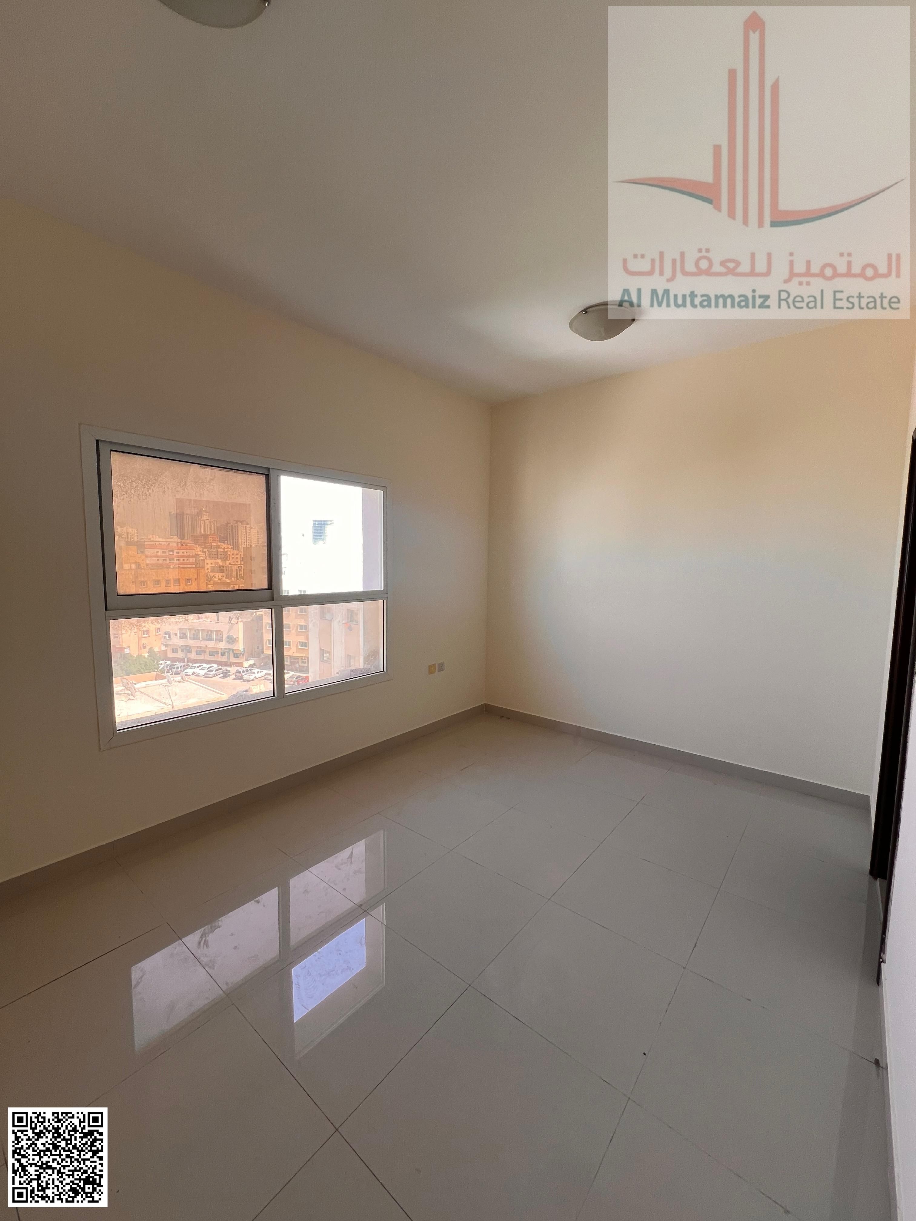 For sale in Ajman: a clean studio apartment in Smart Tower, Al Amrah area, 391 sq ft. Asking price: AED 210,000.