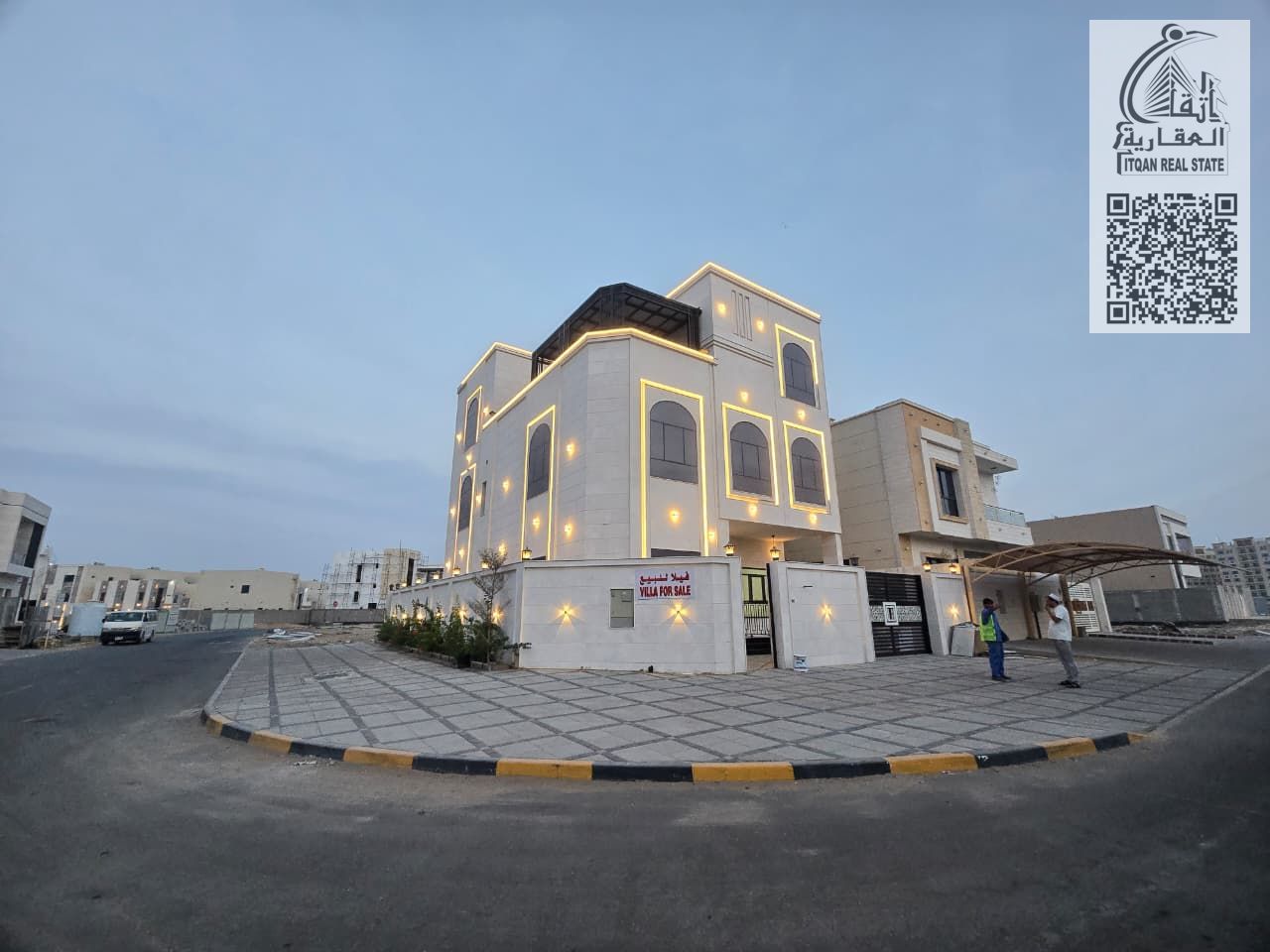 Villa for sale directly from the owner in Al Alia, close to Mohammed bin Zayed Road, corner plot on two streets, with a stone facade.