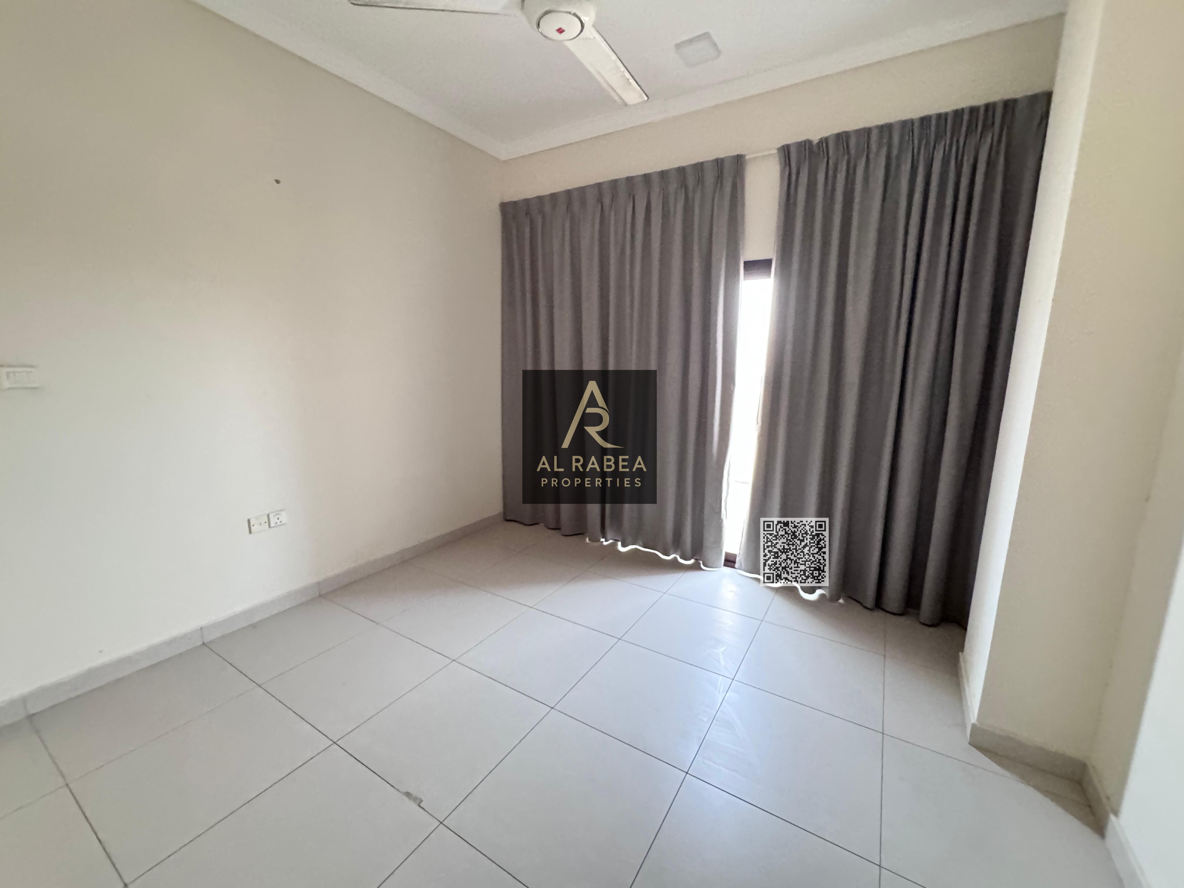 For annual rent in Ajman, Al Rawda 2: Two bedrooms, a living room, two bathrooms, spacious areas, plus a rooftop terrace. Rent is 47,000 AED, payable