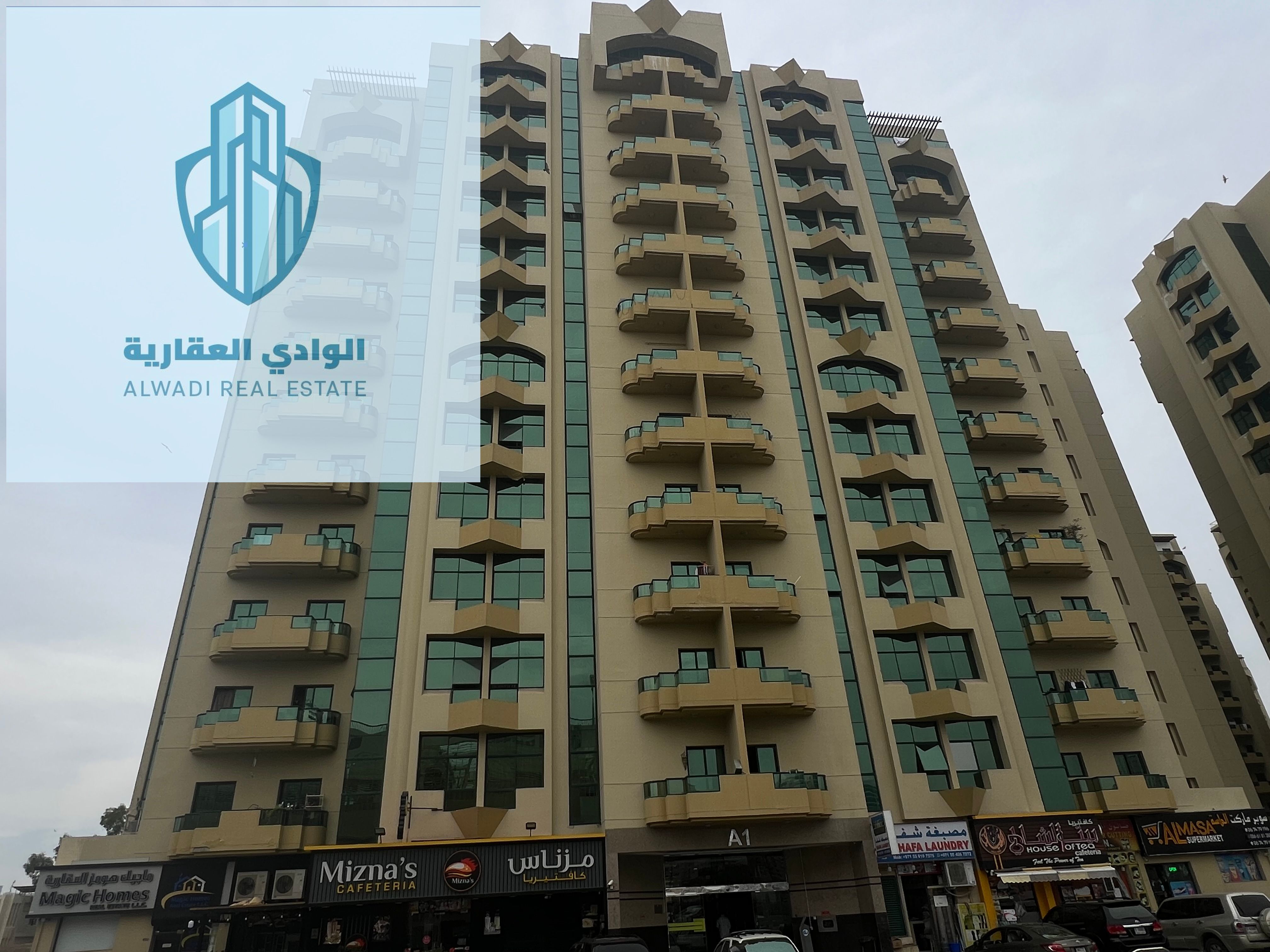 Two bedrooms and a living room for rent in Al Rashidiya Towers, 38,000 dirhams