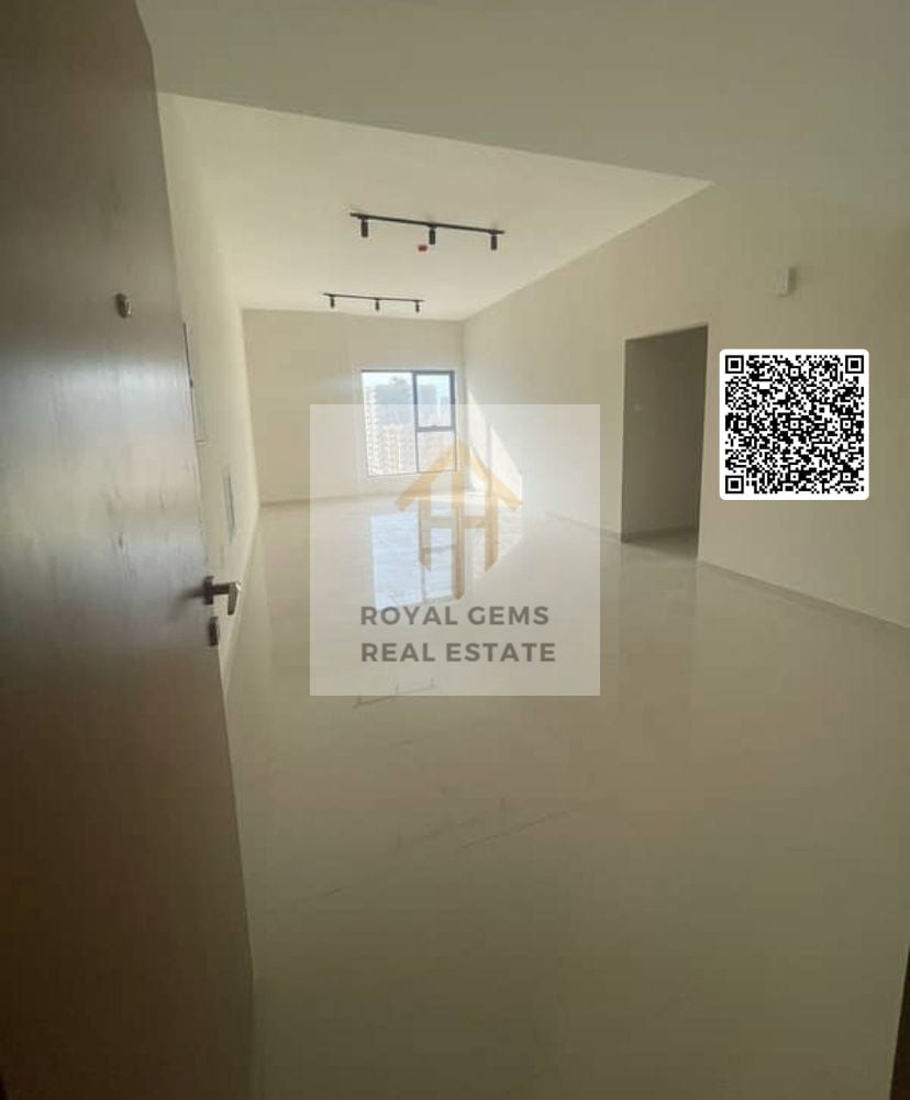 Bright & Spacious Unfurnished 2-BHK in SRS Tower, Ajman | Gym + Covered Parking.