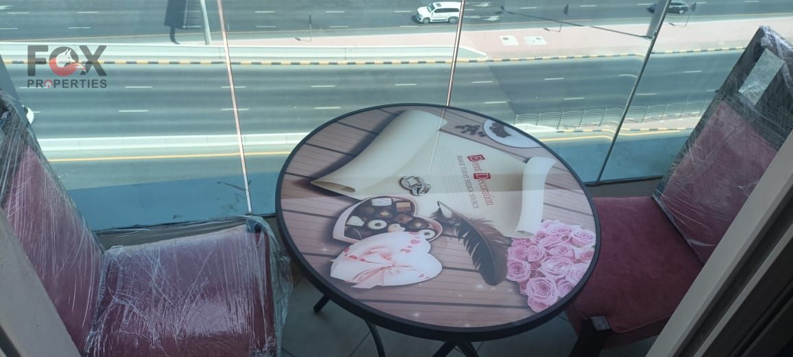 Luxury 2BR apartment in City Tower, fully furnished, central AC, Sheikh Palace view, closed kitchen, flexible installments, excellent ROI, prime locat