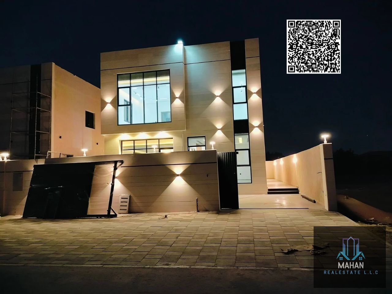A very luxurious villa for sale in Al Helio 2, Ajman. It features an elegant design and excellent finishes, offering spacious and comfortable living areas ideal for families seeking both luxury and comfort. The villa is built on a prime plot of land.