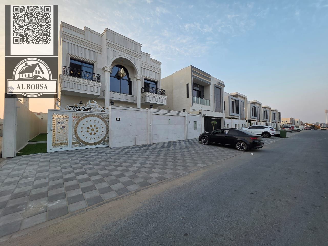 Villa for sale in Al Zahia, Ajman. 7 bedrooms, living room, majlis, maid's room, and spacious kitchen.