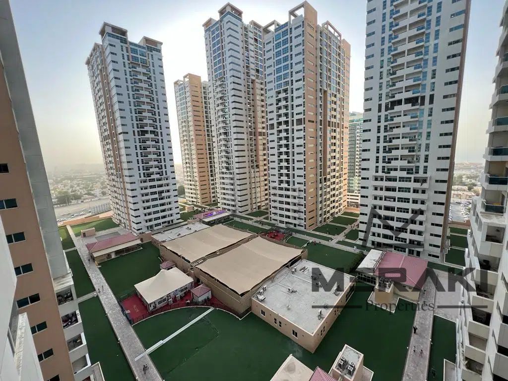 "Two-Bedroom Apartment with a Living Room, 1450 sq ft, for Sale in Ajman One Tower 9 with Monthly Installments of Only AED 5,640. "