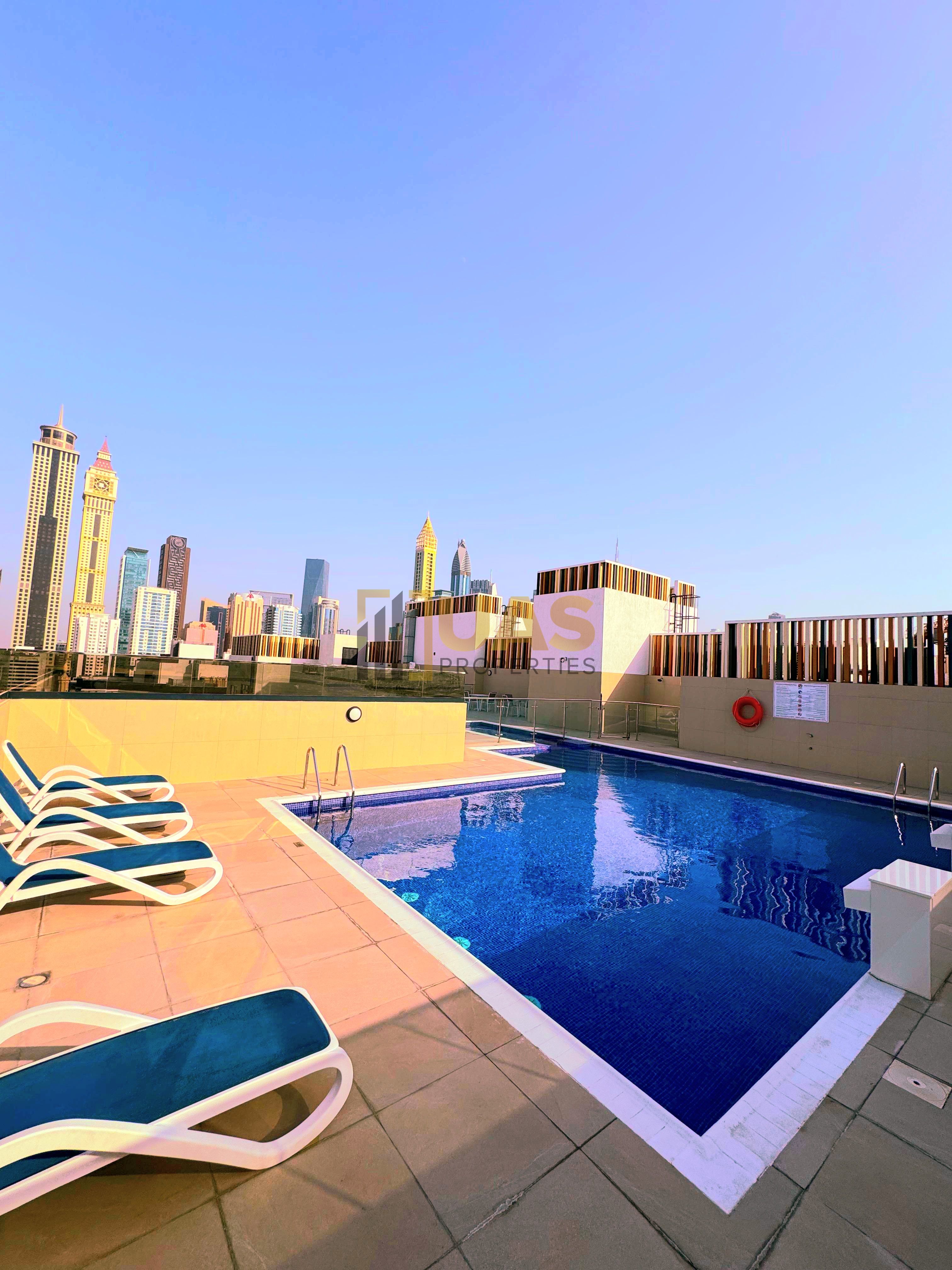 Spacious 1bhk with open kitchen gym pool parking free