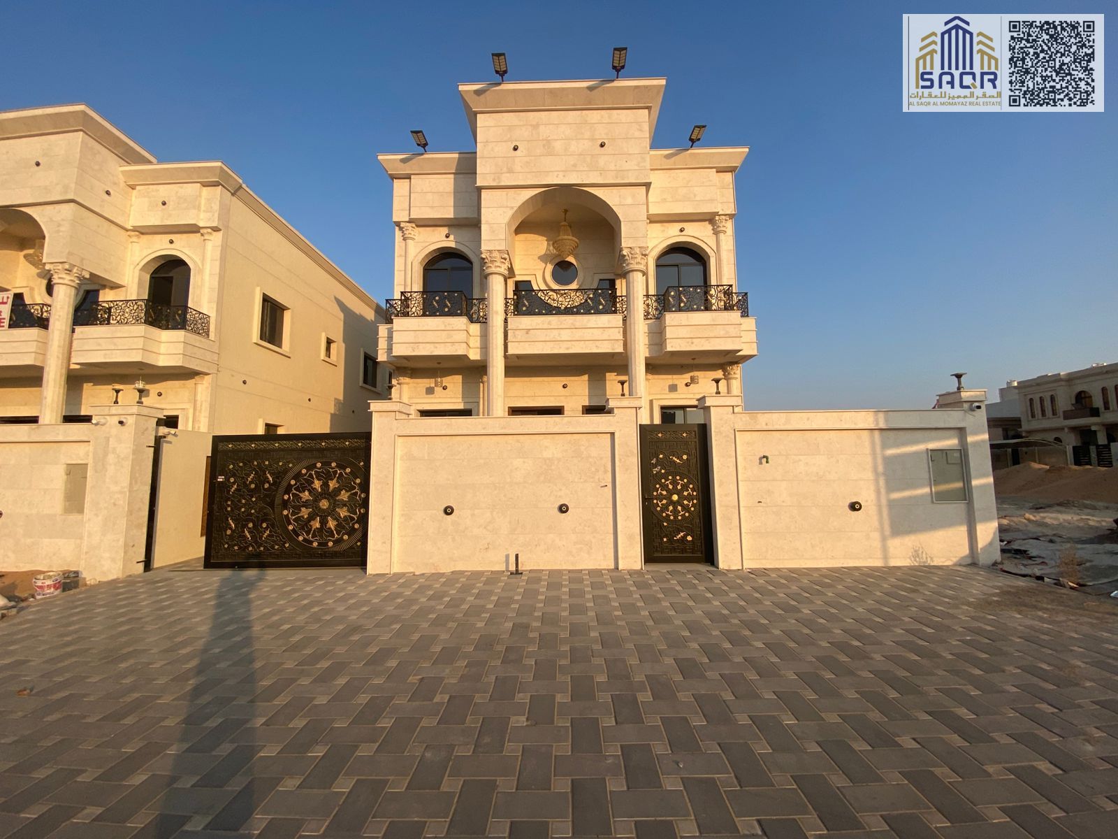 Luxury three-story villa for sale with roof and garden