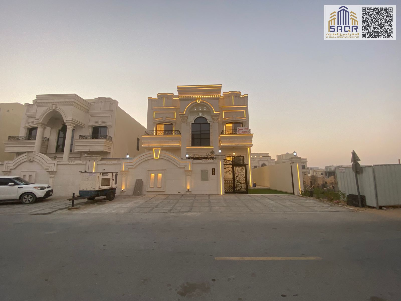 Luxury classic villa for sale with front garden, seating area, and rooftop terrace.