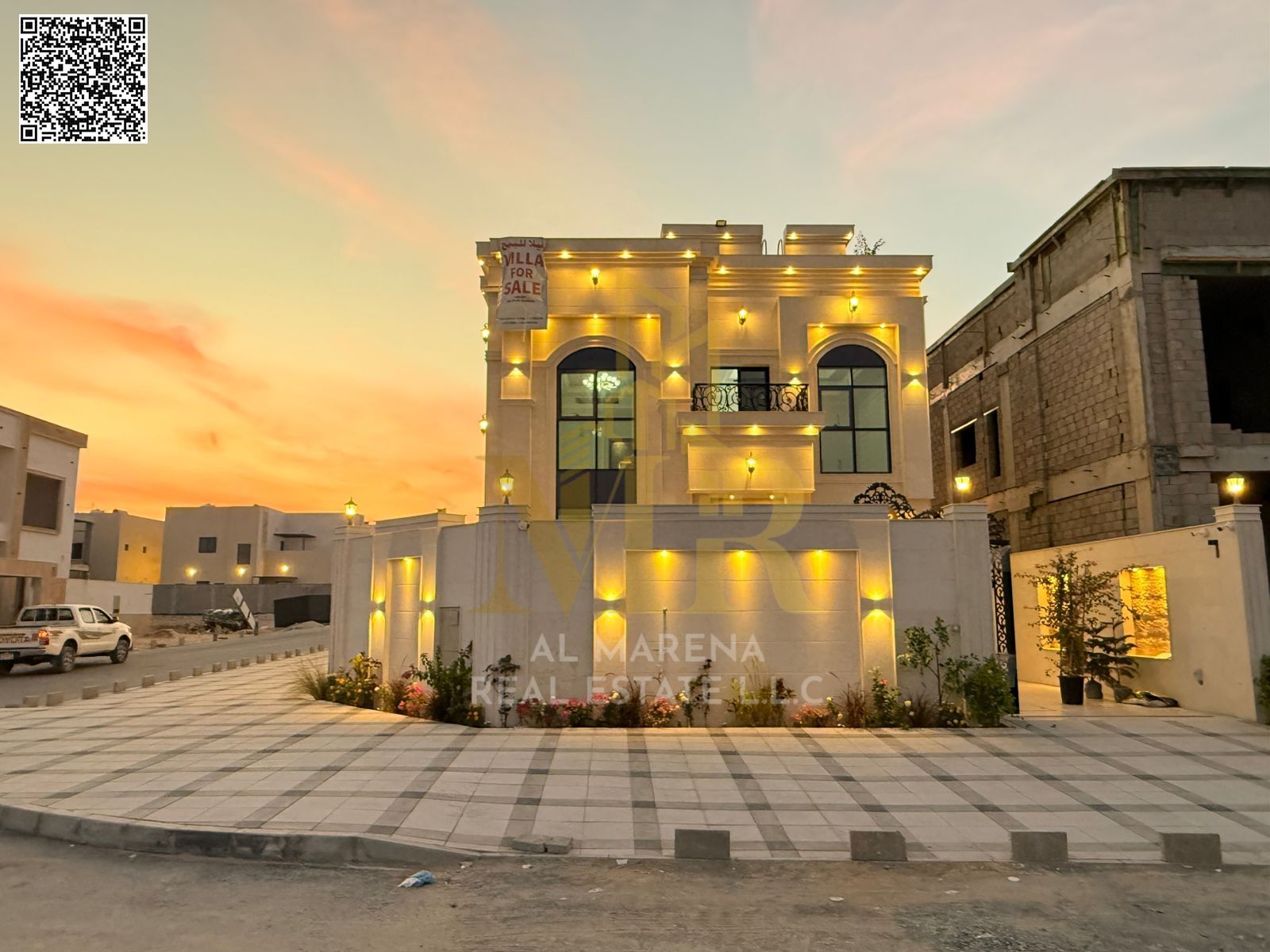 A luxury super deluxe villa for sale in the Halio 2 area of Ajman at a price that includes registration and ownership fees
