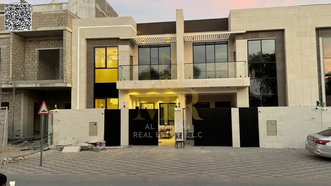 A luxury super deluxe villa for sale in the Yasmin area of Ajman at a price that includes registration and ownership fees