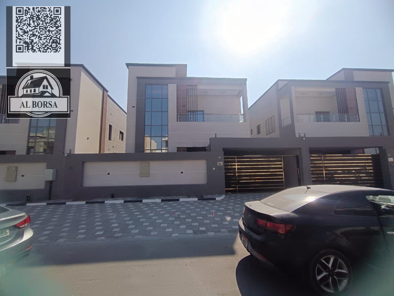 For rent in Al-Haliyo 2, a villa with four master bedrooms, a living room, a majlis, two kitchens, a balcony, and central air conditioning.