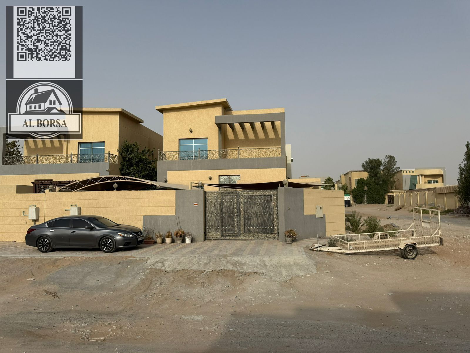 For sale in Al Rawda 1, a corner villa on the corner of two streets with a large side setback, consisting of 5 master bedrooms / 2 living rooms with a