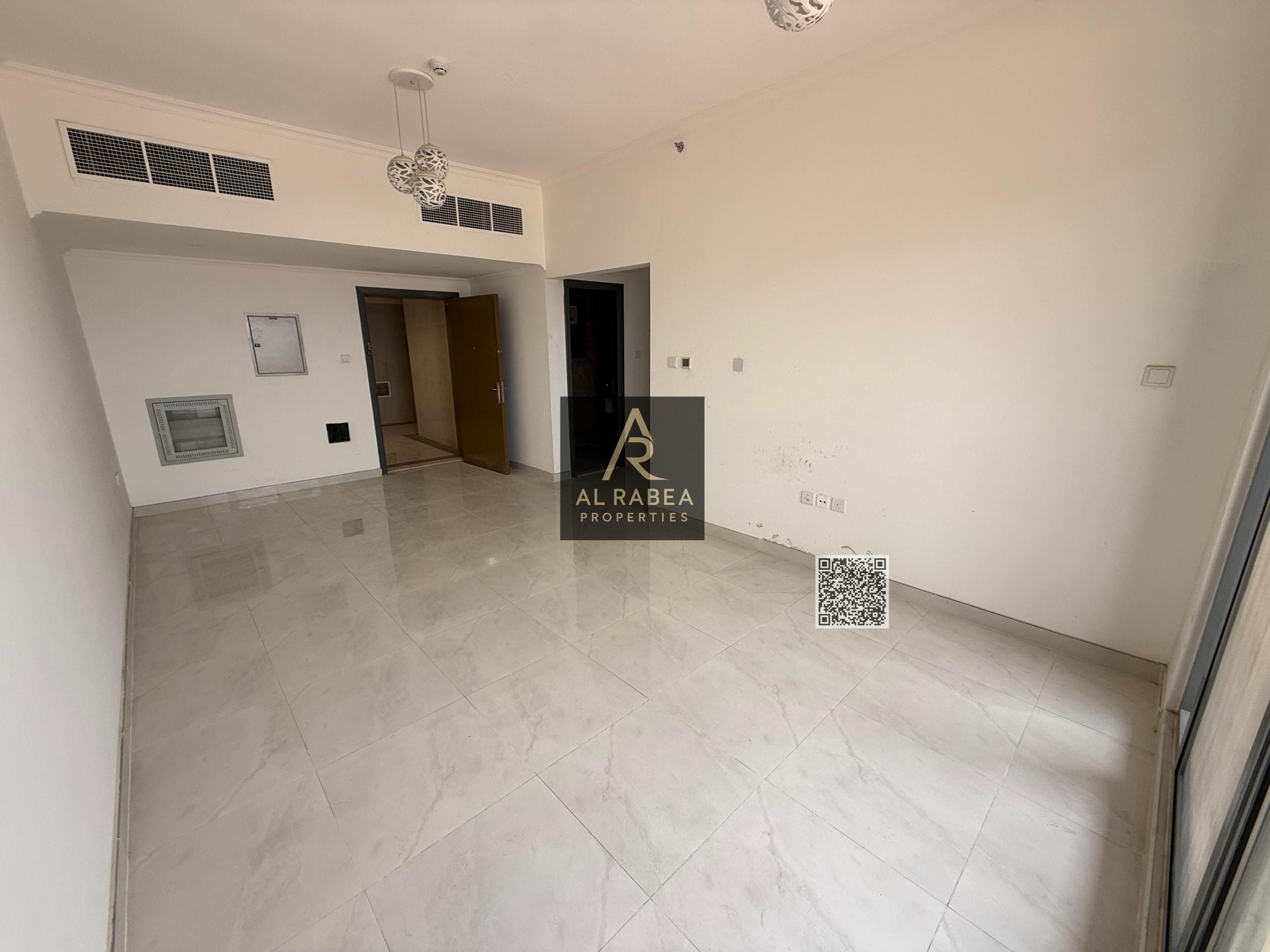 One bedroom and living room, enclosed view, first occupancy