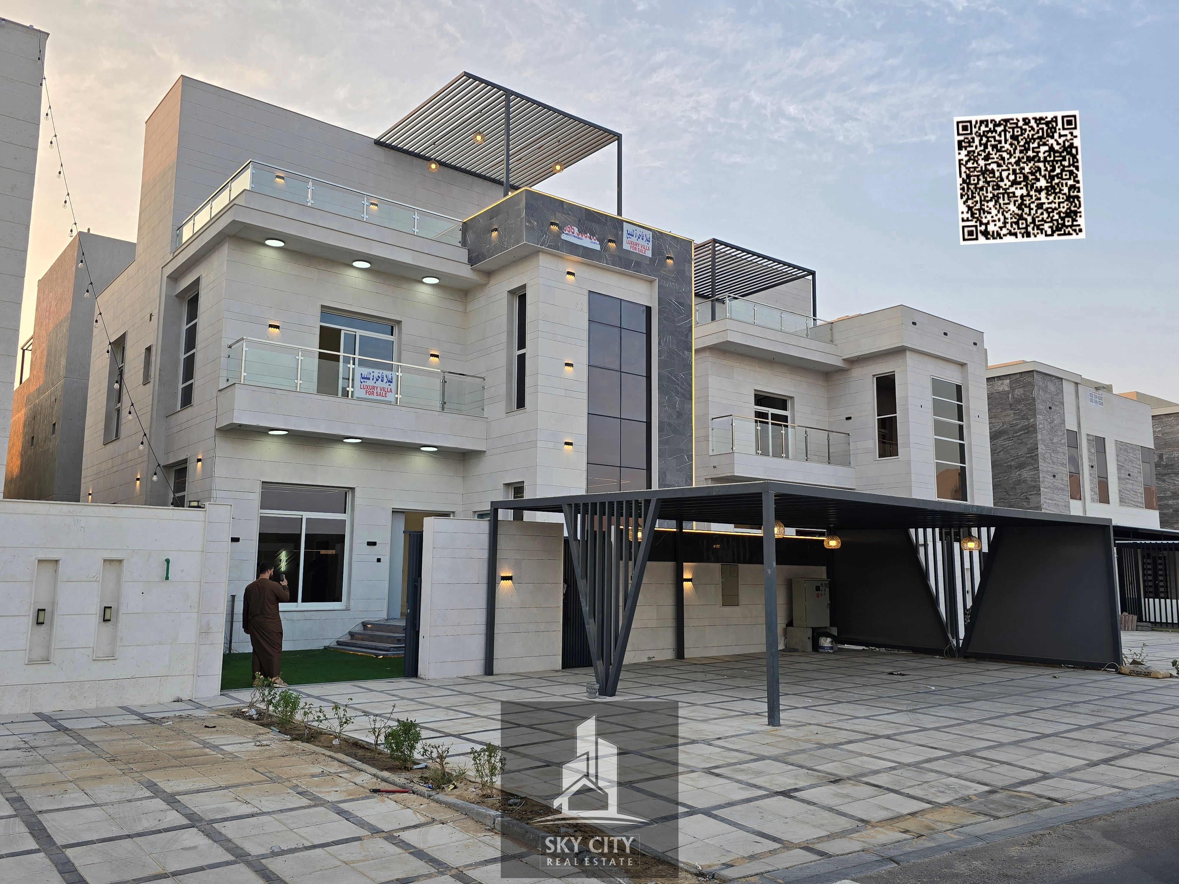 For sale: Residential/commercial villa on a main street, high-end finishing, directly opposite Al Hamidiya Park on Sheikh Khalifa Street, registration