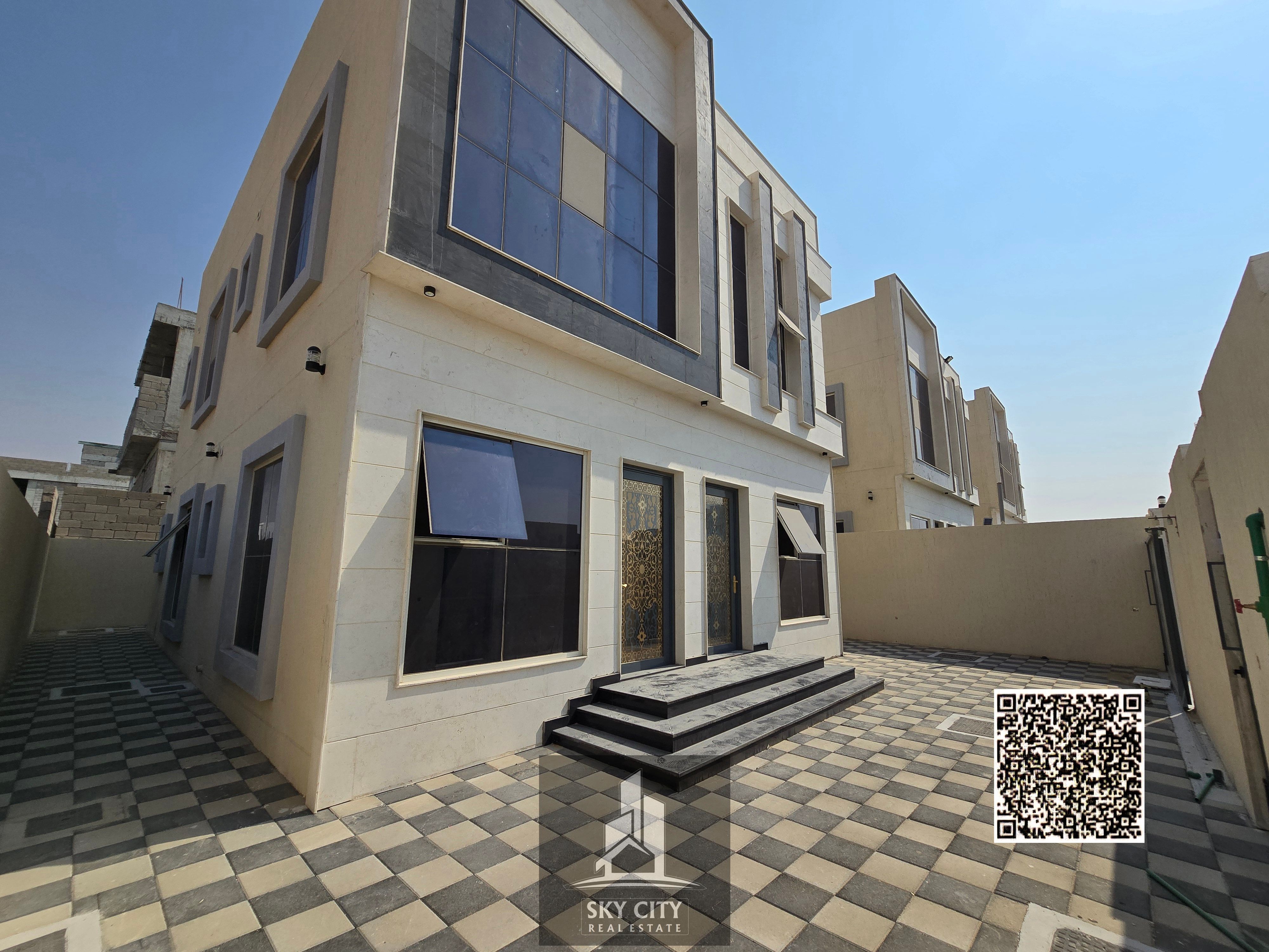 Villa for sale next to the mosque, behind the Emirates Towers, including registration fees.