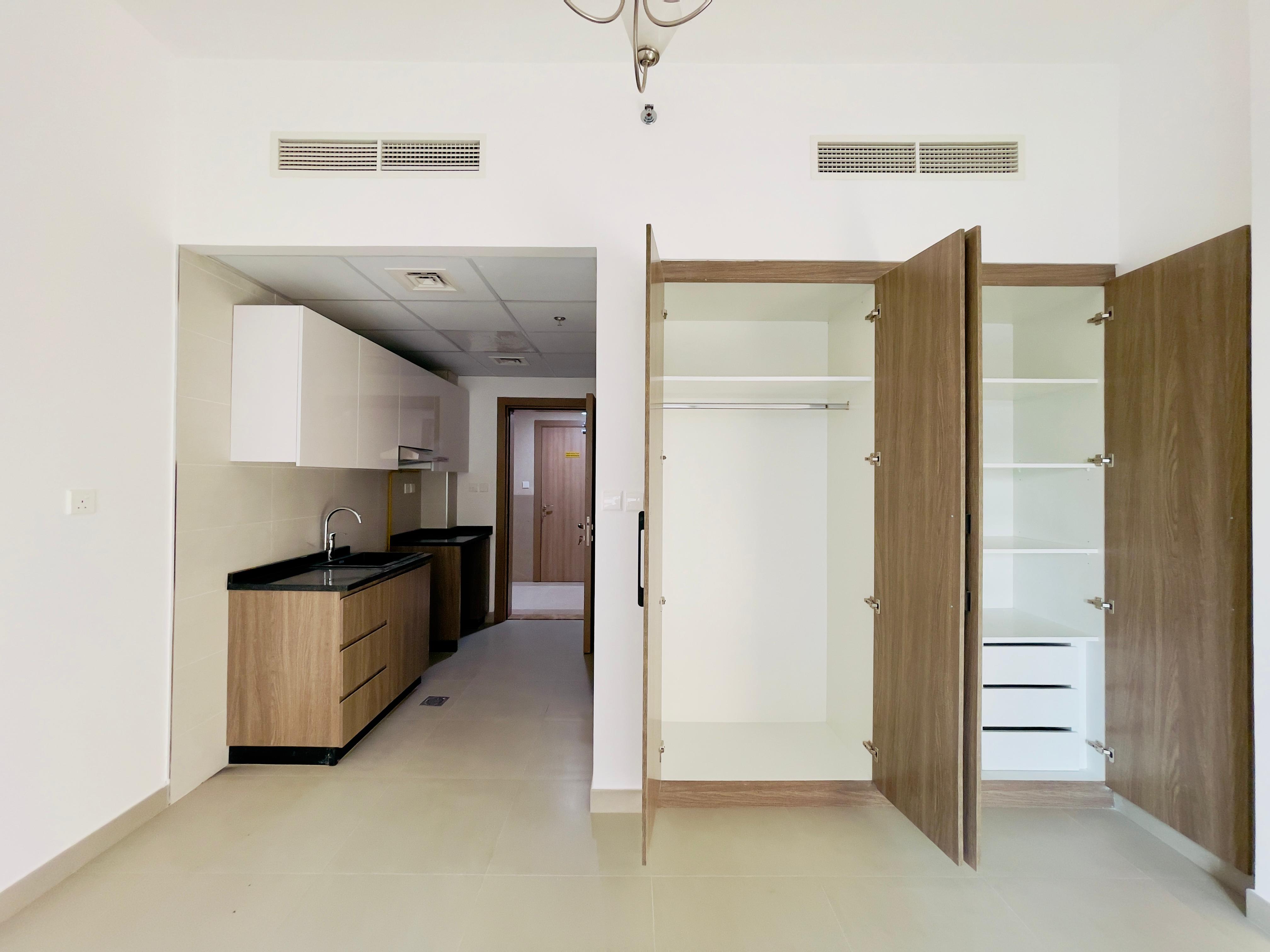 Studio haven in the brand new building in warsan 4 with gym, pool, kids play, inside parking garden area